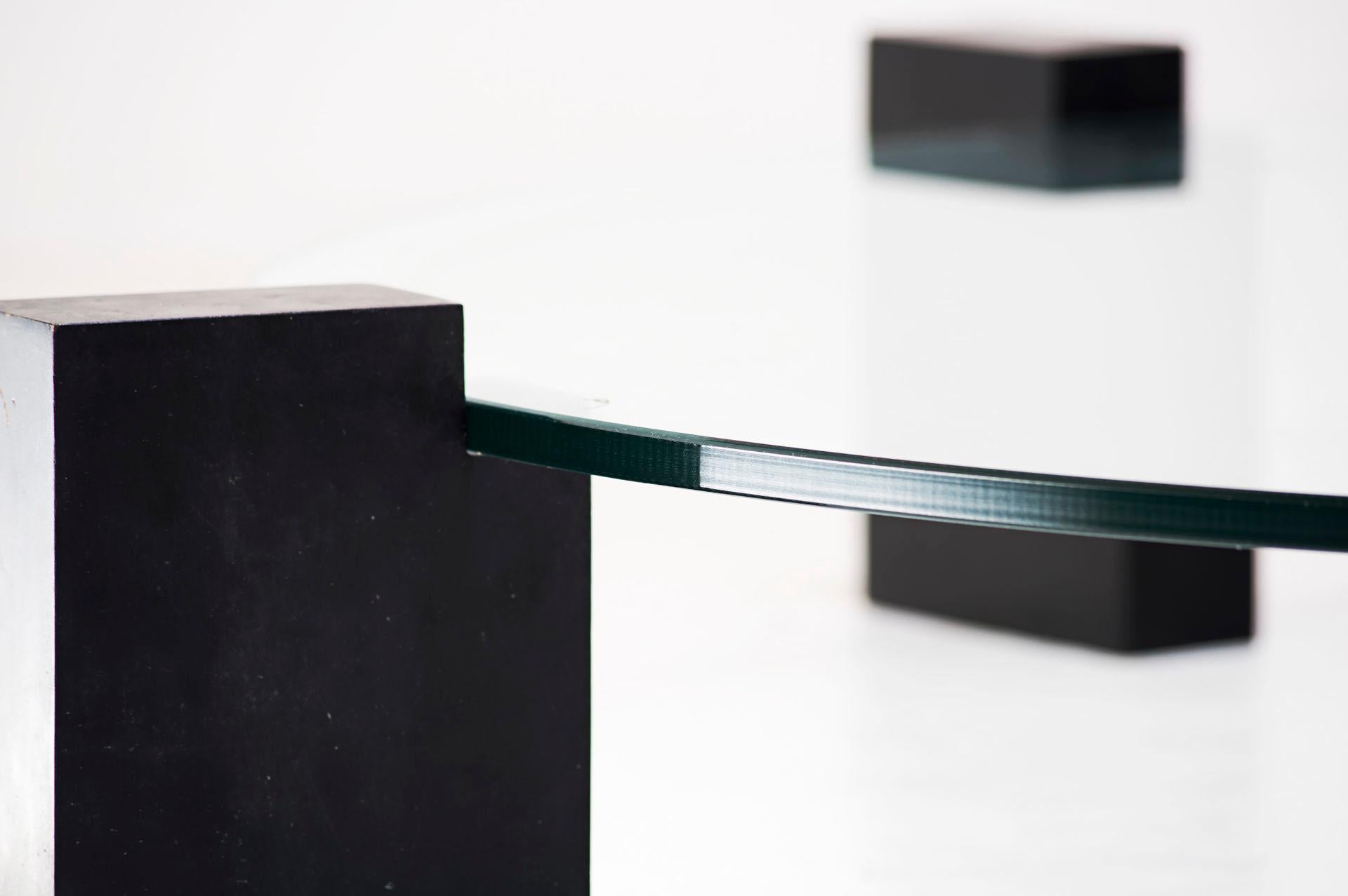 Coffee table
Manufactured by Tepperman
Brazil, 1991
Ebonized wood legs, glass top.

Measurements
130 Ø cm x 20,3h cm
47,2 Ø in x 8h in

Literature
Aric Chen, Brazil Modern. The monacelli Press, Brazil, 2016. Page 271.

Provenance
Private collection,