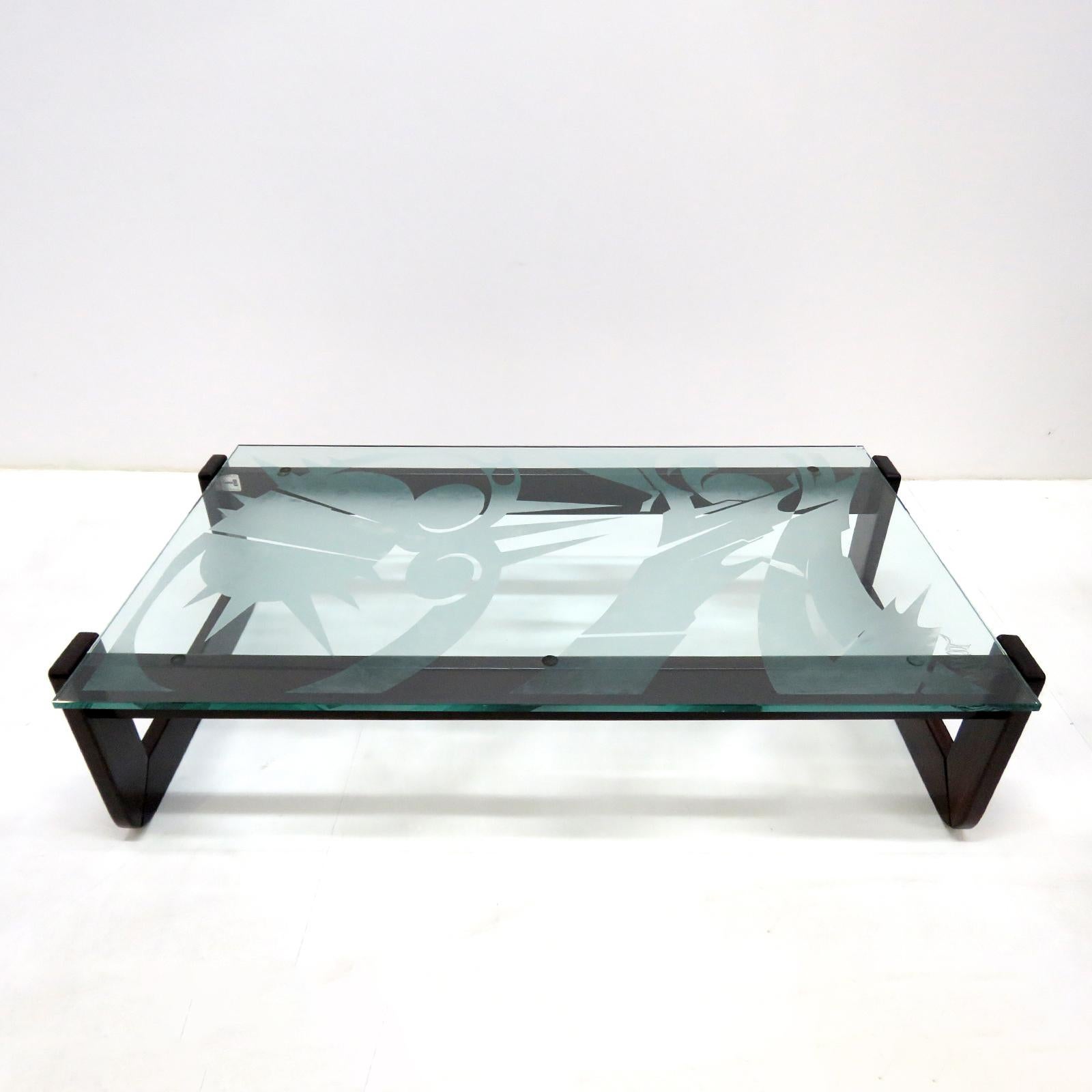 beautiful, well made coffee table by Maurice Percival for Lafer, in dark brazilian rosewood marked with the Lafer label, shown with custom artist etched glass top, clear glass top available upon request.