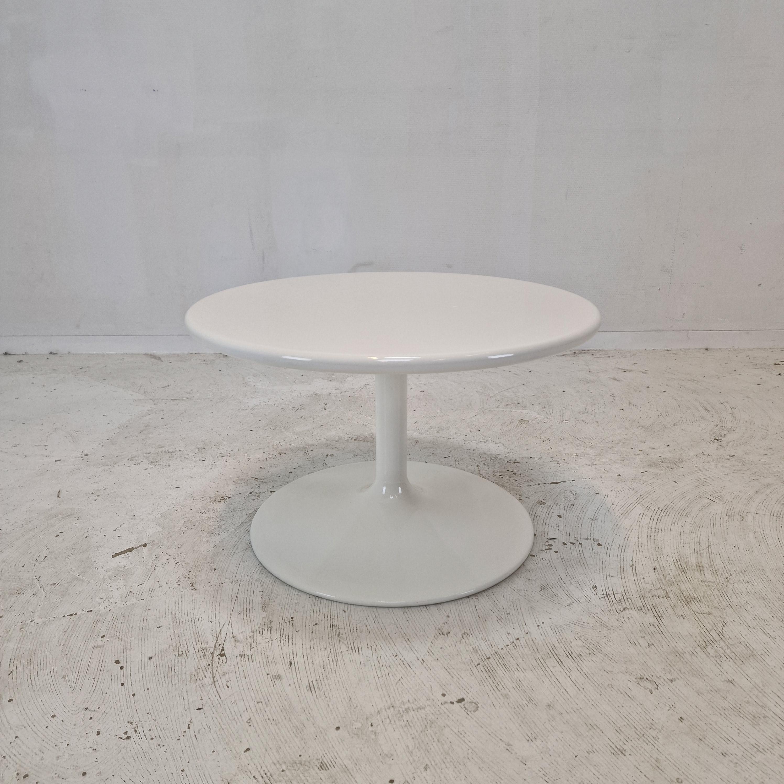 Very nice round coffee table, designed by Pierre Paulin in the 70's. 
The name of the table is 