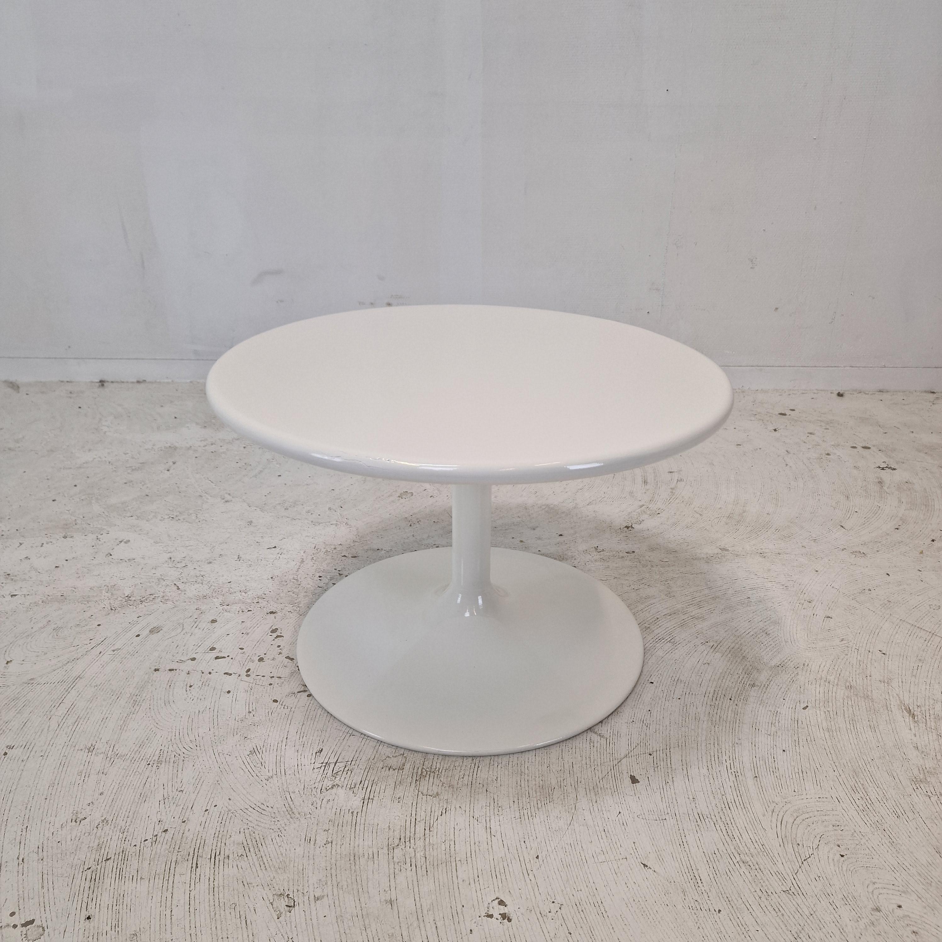 Very nice round coffee table, designed by Pierre Paulin in the 70's. 
The name of the table is 