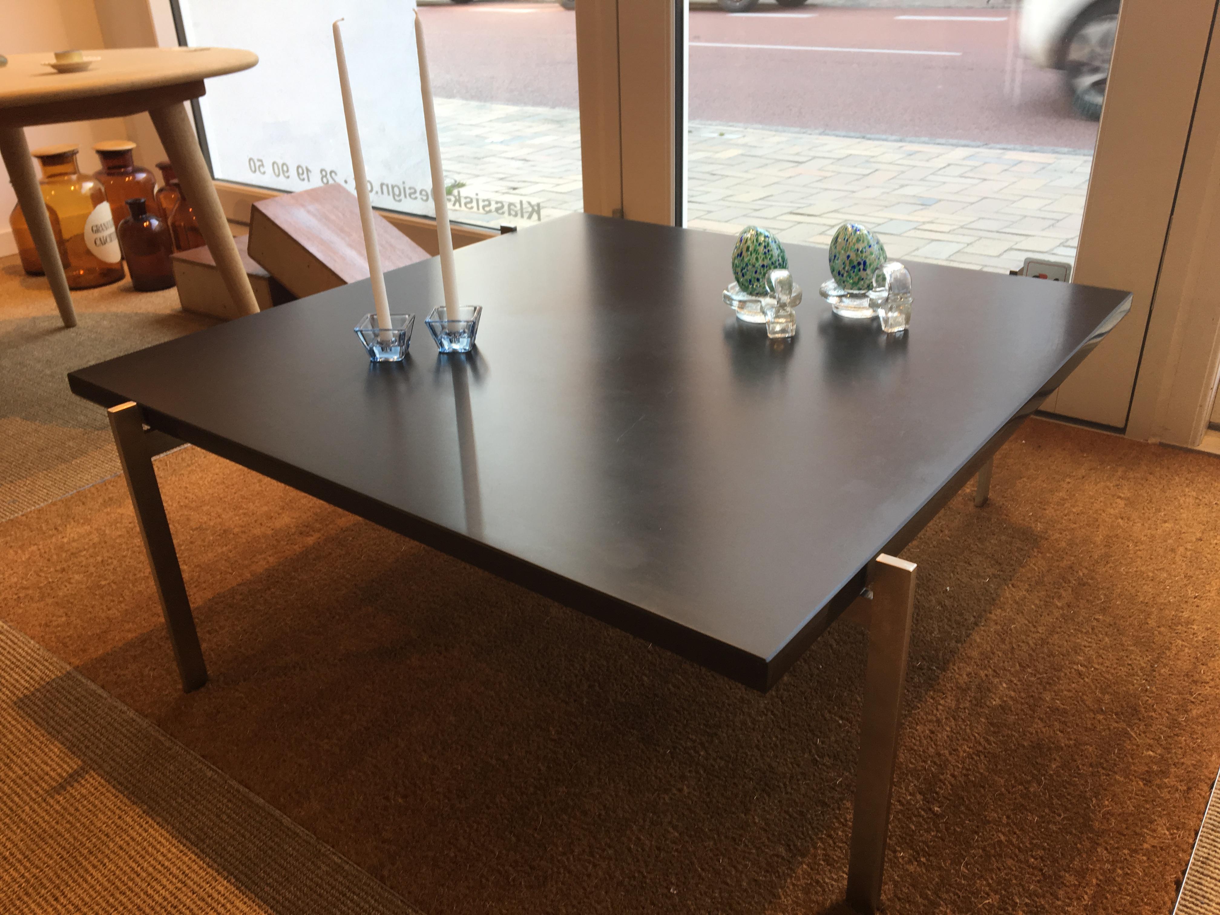 Coffee table by Poul Kjærholm for Fritz Hansen 2007, Danish steel and stoneware.
PK61 Poul Kjærholm coffee table is made of spring steel and polished slate plate with minimal traces of wear.
The table is in very fine condition with minimal traces