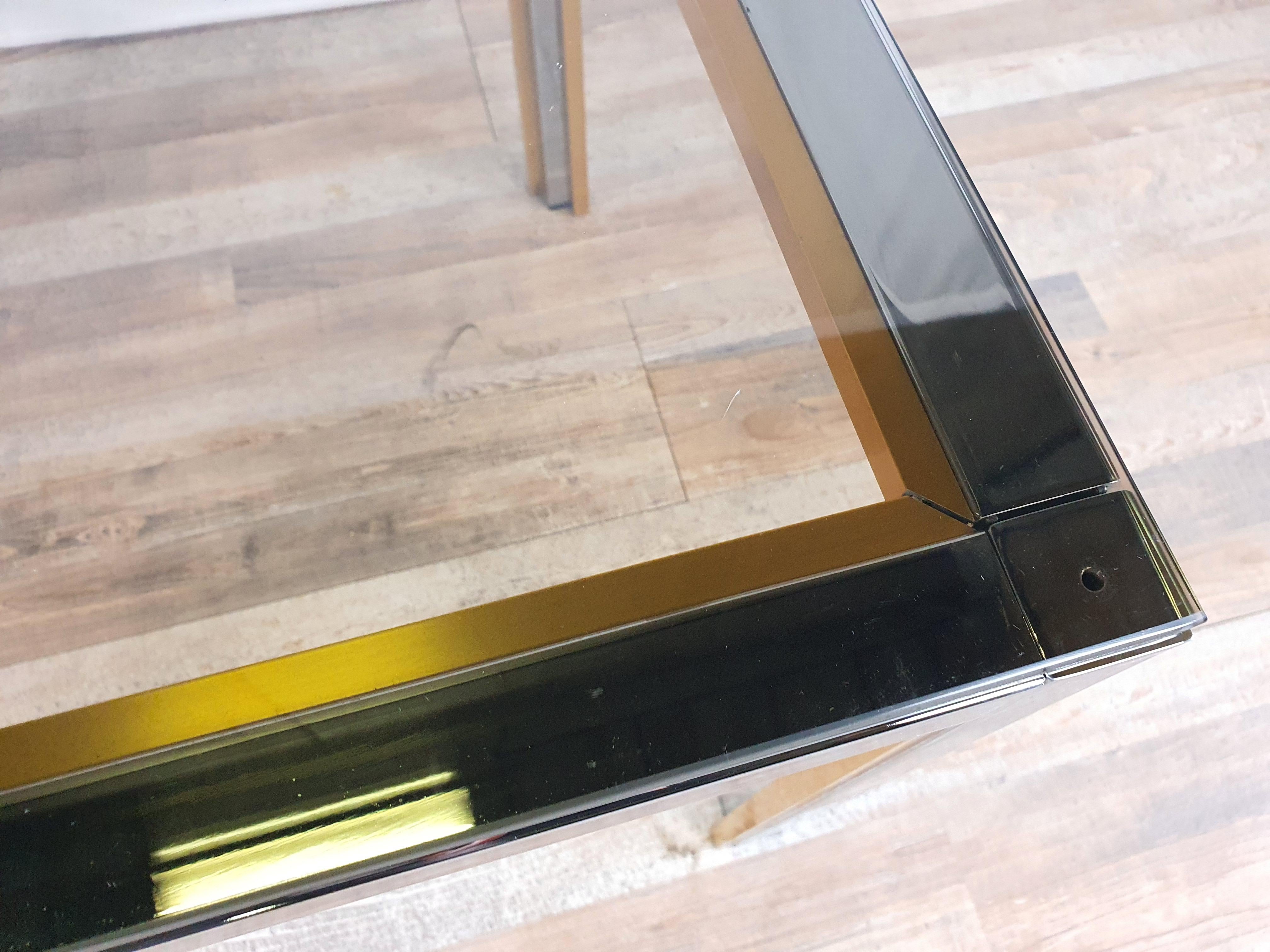 Vintage 70s coffee table in steel and original smoked glass top of the time.

It lends itself as a coffee table or designed for a place in the living room, thanks to the compact and linear dimensions it lends itself to any kind of modern or