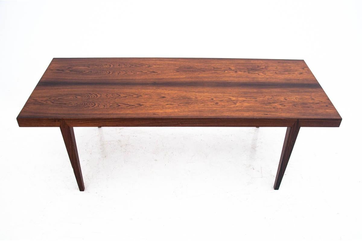 Coffee table made in Scandinavia in the 1960s. Designed by Severin Hansen.

Has an additional pull-out tray.

The furniture was made of rosewood. The table is after renovation.

Dimensions:

Width 150 cm, height 50 cm, depth 60 cm.