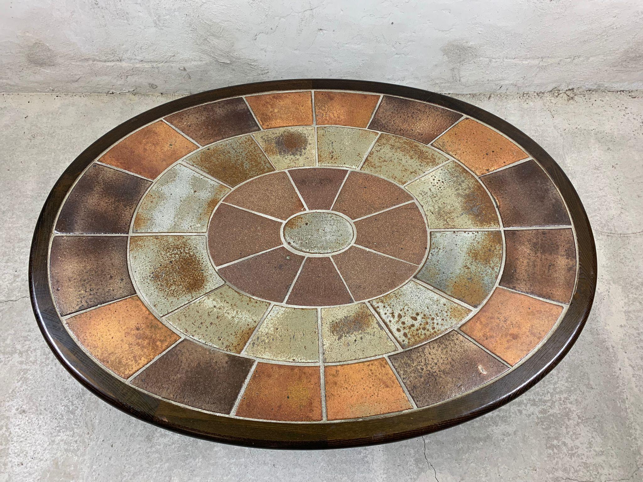 Pine and ceramic tile oval coffee table by Tue Poulsen for Haslev Mobelsnedkeri. 1960’s. 140x95x37