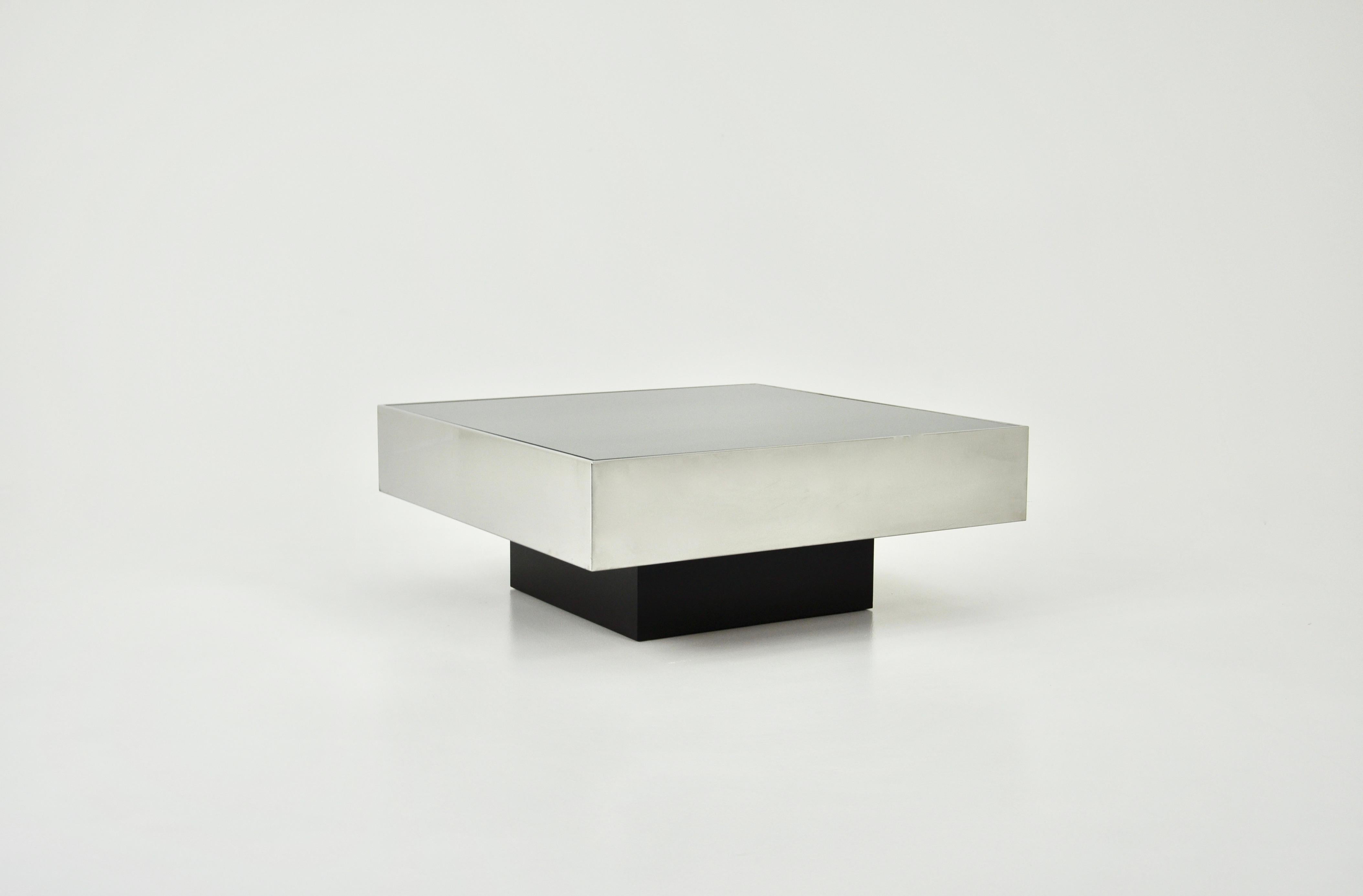 Coffee table in brushed steel with a smoked glass mirror top. Designed by Willy Rizzo and produced by Cidue in the 1970s. Wear due to time and age of the table.