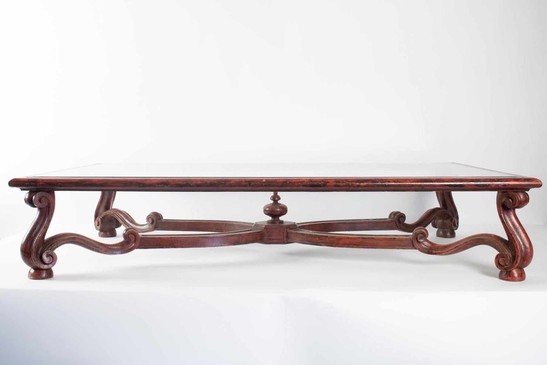 Coffee table carved wood, patinated brown red inspired by Louis XIV Forms, work of a Parisian decorator of the year 1950 in the taste of the House Jansen.
Measures: L 130cm, D 73cm, H 25cm.