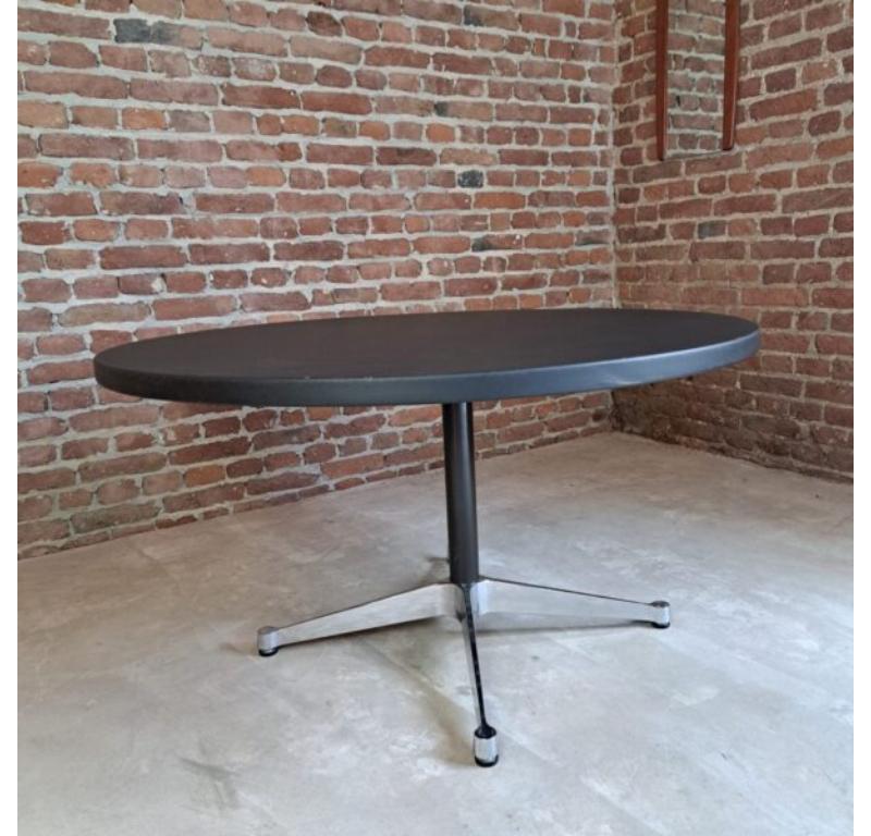 Coffee Table Charles & Ray Eames for Vitra, Italy, 1960s

Additional information:
Country of Manufacture – Italy
Design Period – 1960
Production Period – 1960
Style – Midcentury
Material – Aluminum frame with black lacquered round table top.
Color –