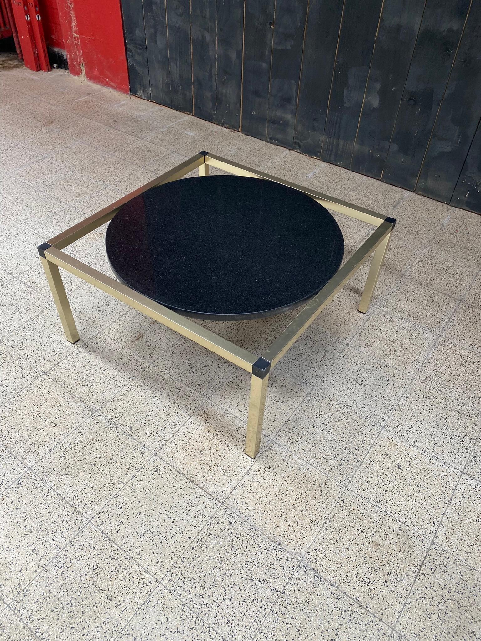 original coffee table in varnished metal, black marble top.
the tray measures 60 cm in diameter.
