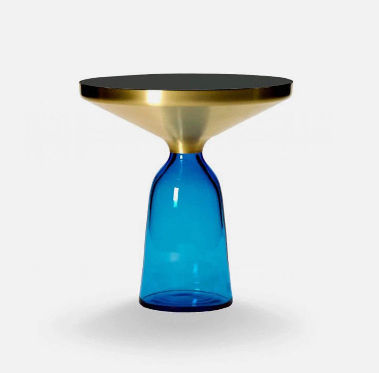 ClassiCon - Bell Side Table
Design: Sebastian Herkner

The Bell Side Table by Sebastian Herkner for ClassiCon redefines contemporary design by challenging our usual perceptions of materials. Its base, crafted from hand-blown glass, transforms a