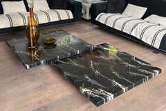 Coffee Table Composed of Two Designer Faux Marble Tables Resting on Chrome Legs