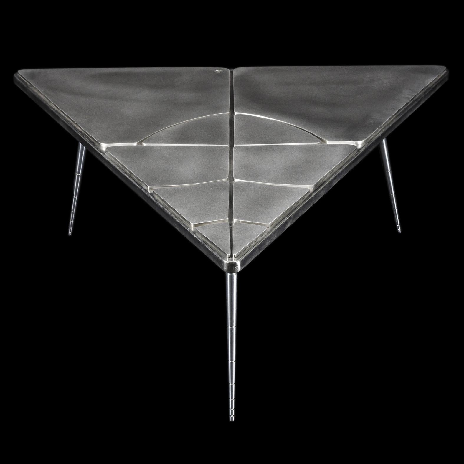 In stock, made in France: This contemporary coffee table is a unique piece, created by Xavier Lavergne and sold with its authenticity certificate. The top is made of wood wrapped with pewter, like a french bar countertop. It will develop a unique
