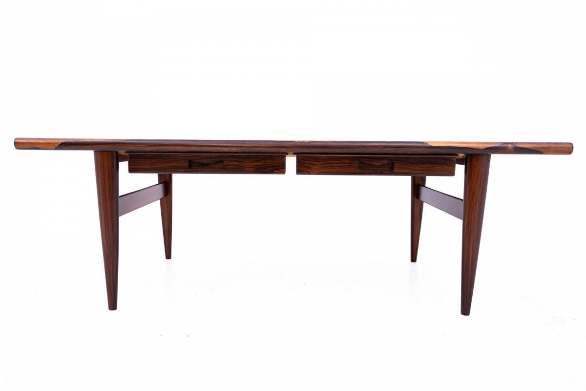 Table-bench made of rosewood wood in Denmark, in 1960s.
Under the table surface two drawers. 
Very good condition, after professional renovation.
dimensions height 50 cm width 150 cm depth 60 cm