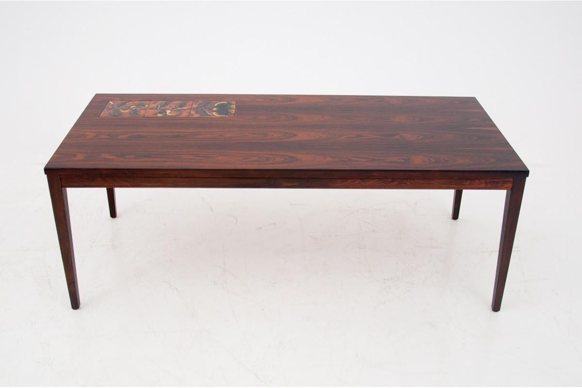 Table, Danish design, 1960s

A minimalist table with a small ceramic element on the top. It will work great in modern interiors. Very good condition, after professional renovation. The wood has been cleaned and finished with a durable
