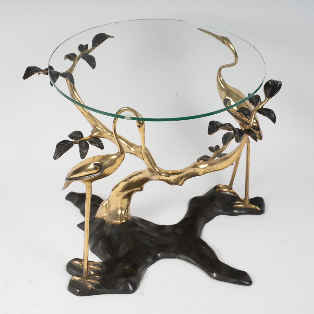 Coffee table, end of sofa in patinated and gilded bronze, flamingo design.

Design coffee table, gilt and patinated bronze end of sofa, flamingo design, glass top, 20th century.
H: 48cm, D: 50cm
