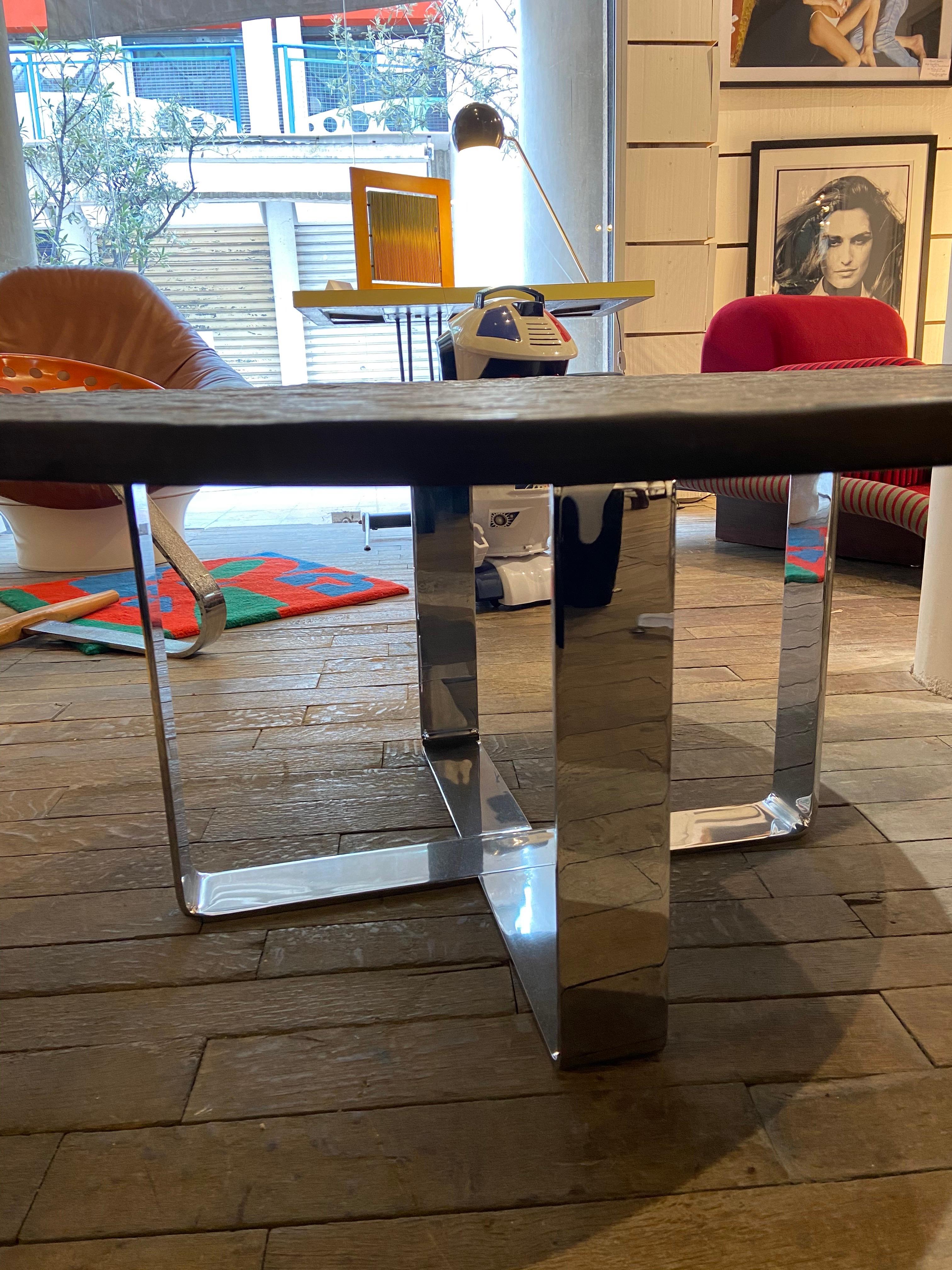 Coffee table - French work
Slate and stainless steel
circa 1970.

Measures: D 110 x H 48 cm 
Good condition.