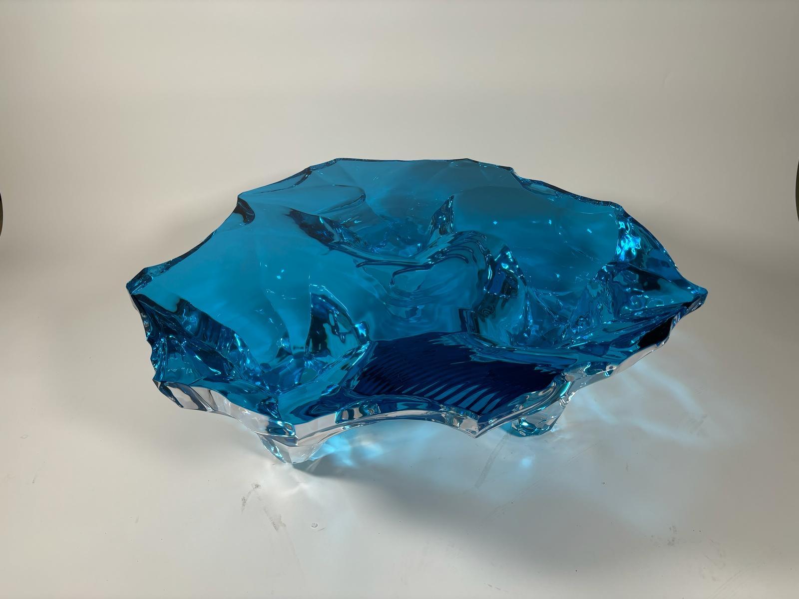 Coffee table Glacialis azure small version designed by Marco Pettinari for Superego Editions.
This sculpture/coffee table made from a transparent Plexiglas block, it made by hand and with numerical control machinery.
Limited edition of 9