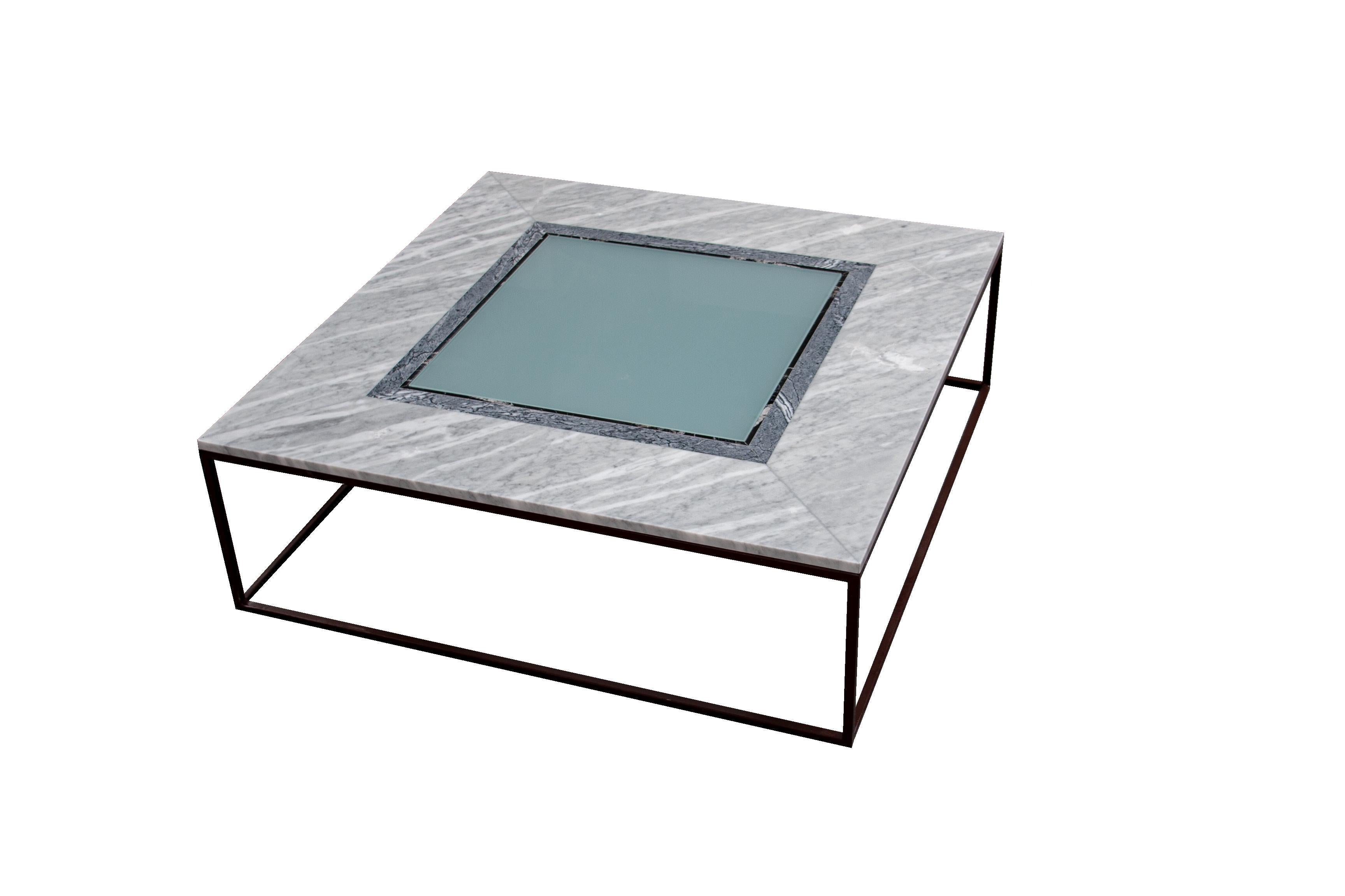 Coffee Table Grey Marble & Smoked Glass One-of-a-Kind Piece Spain Contemporary is a unique marble table with three varieties of marble in polished finish.
On the surface, gray marble of Portuguese origin prevails, with two small plinths of dark