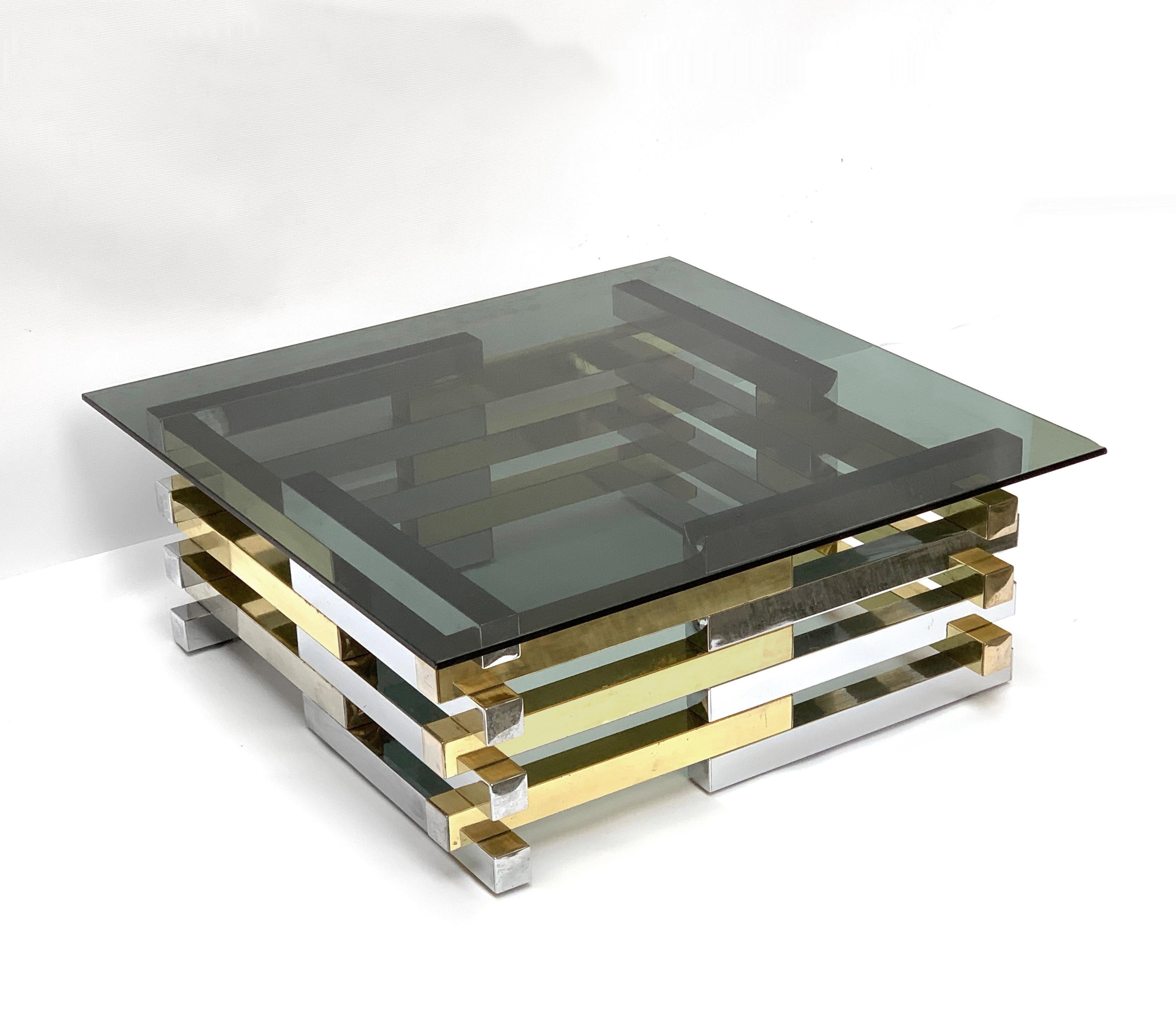 Coffee table with square smoked glass top, in brass and chrome. By Pierre Cardin, France, circa 1970
It can be used as a coffee table or side table.
The base excluding the glass measures: 70 x 70 height 30 cm
The brass and chrome base can also