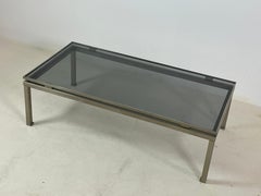 Table basse en laiton et plateau en verre fumé par Guy Lefevre, 1970