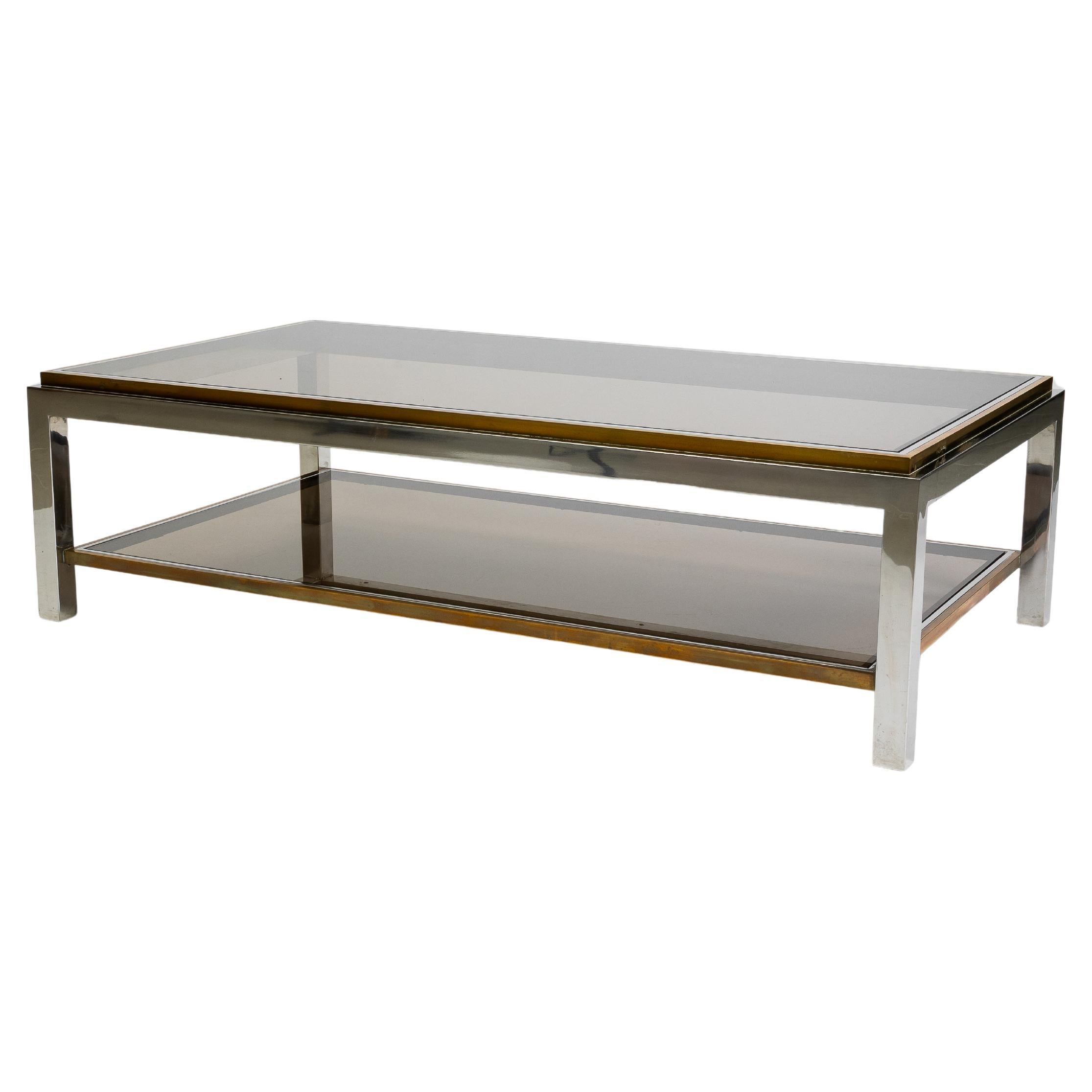 Coffee table in brass chrome and glass, signed Jean Charles