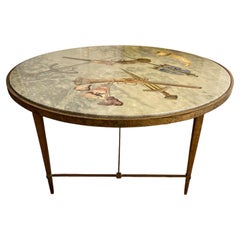 Mesa de centro de bronce con tapa de mármol pintado