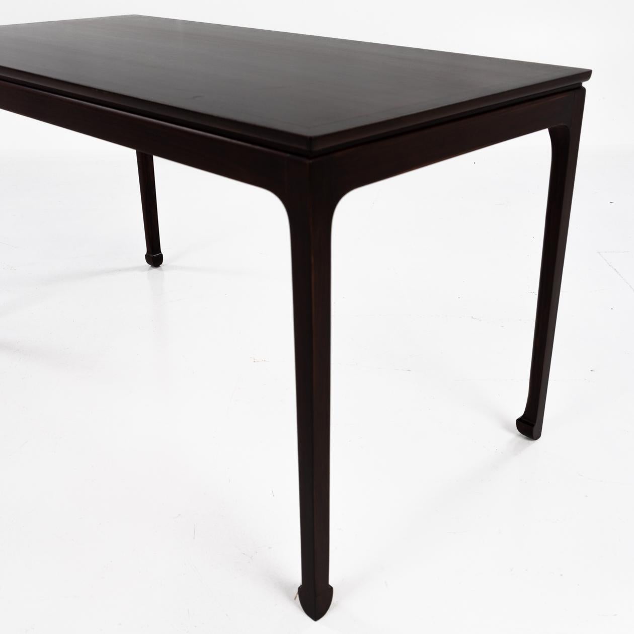 Scandinavian Modern Coffee table in dark rosewood by Ole Wanscher For Sale