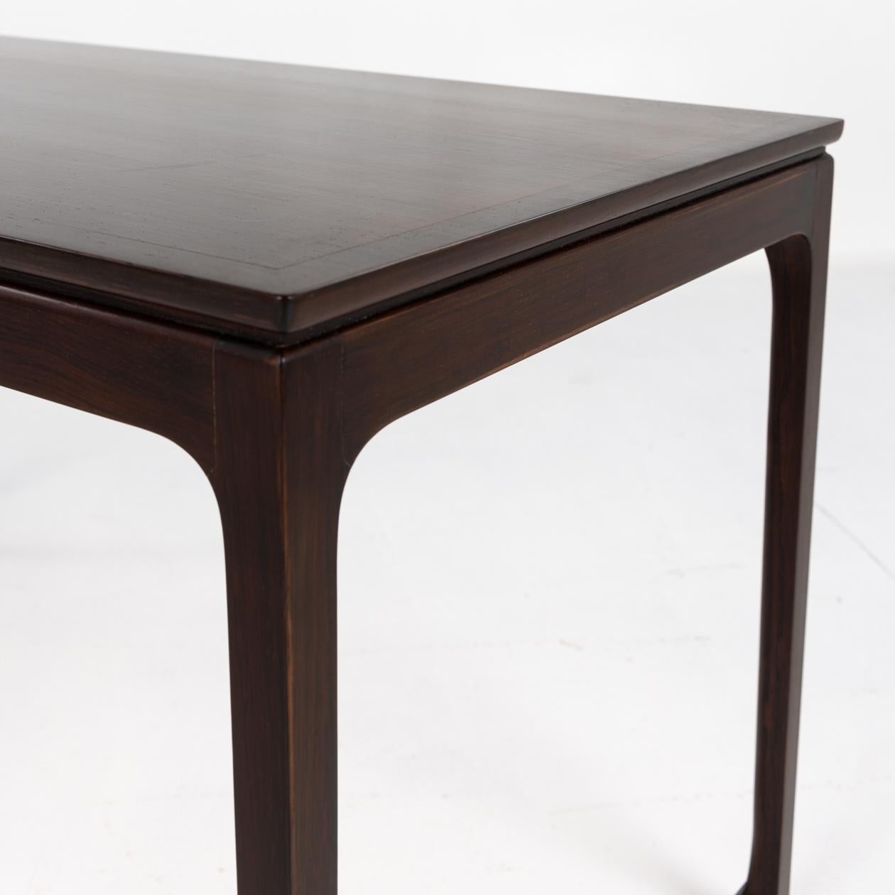 Rosewood Coffee table in dark rosewood by Ole Wanscher For Sale