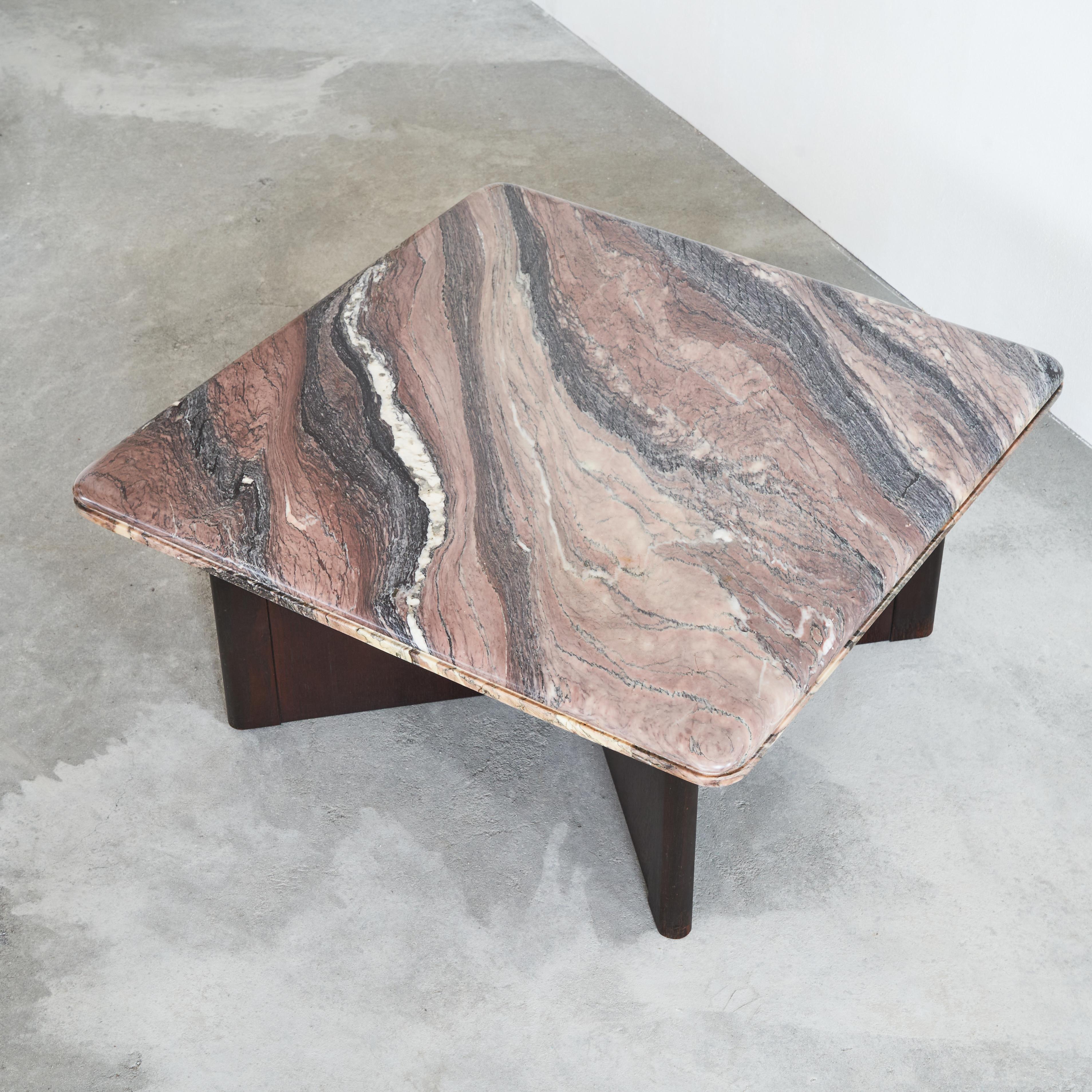 Coffee table in expressive marble and oak, 1970s.

This is a wonderful coffee table with a base in oak and a marble top. The marble features a very expressive and colorful vain and gives this table a very elegant and interesting look. The oak base