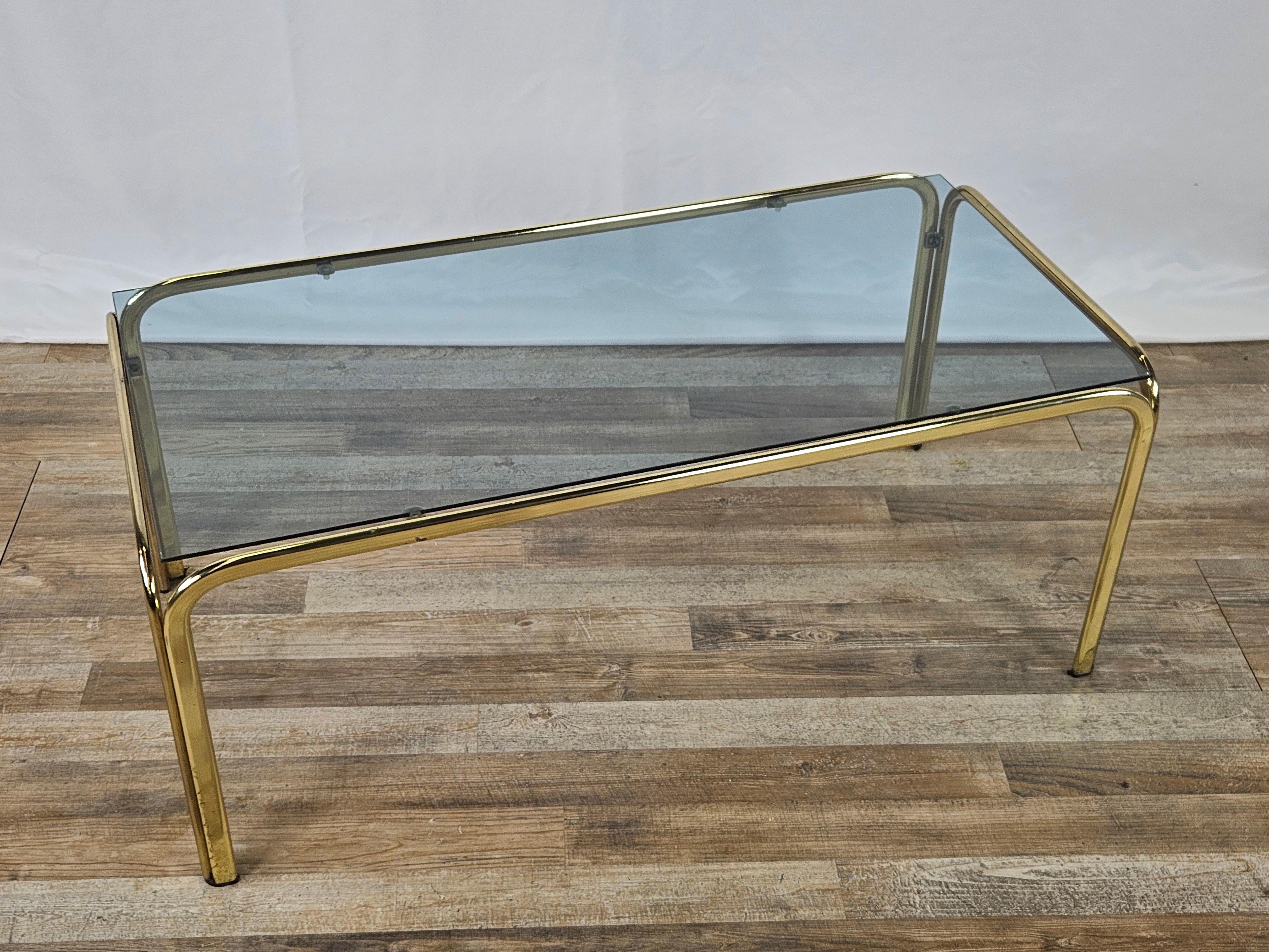 Coffee table in glass and brass of Italian production, circa early 1970s.

Small and functional, it is seen as a modern design piece of furniture to be placed in every corner of the house or office.