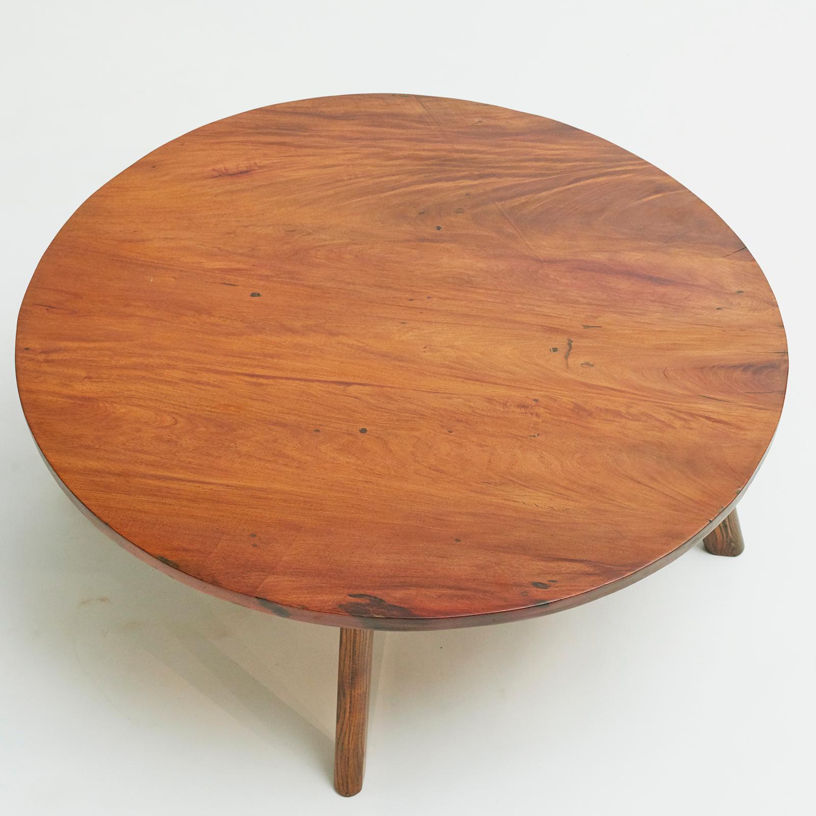 Coffee table. The tabletop is one piece of Narra wood, a beautiful type of wood from the Philippines. Narratra is their national tree and is today protected. Later undercarriage made of elm wood.