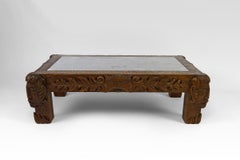 Coffee table in oak carved with faun heads and marble top, France, Circa 1940