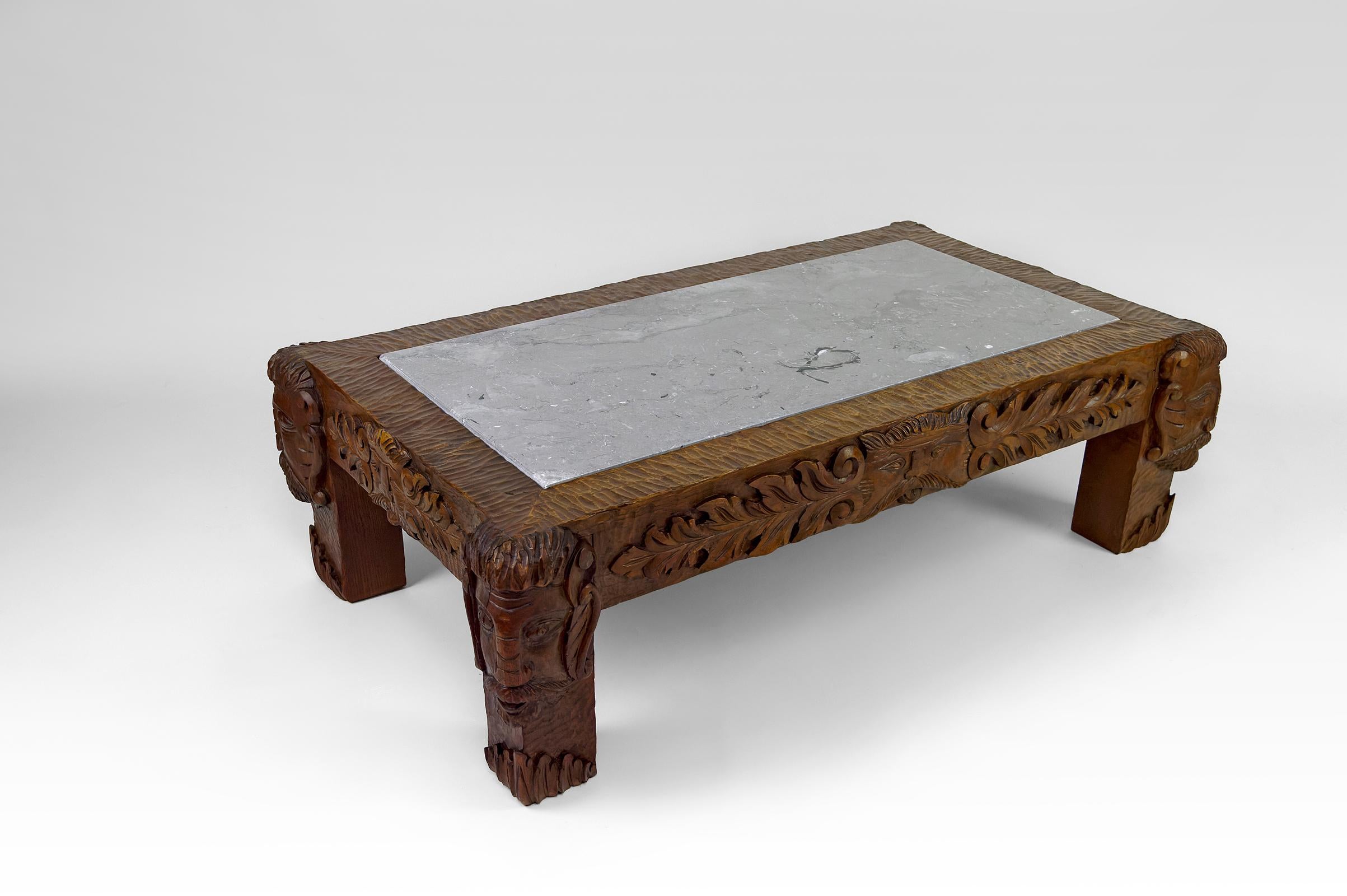Coffee table in oak carved with faun heads and marble top, France, Circa 1940 In Excellent Condition For Sale In VÉZELAY, FR