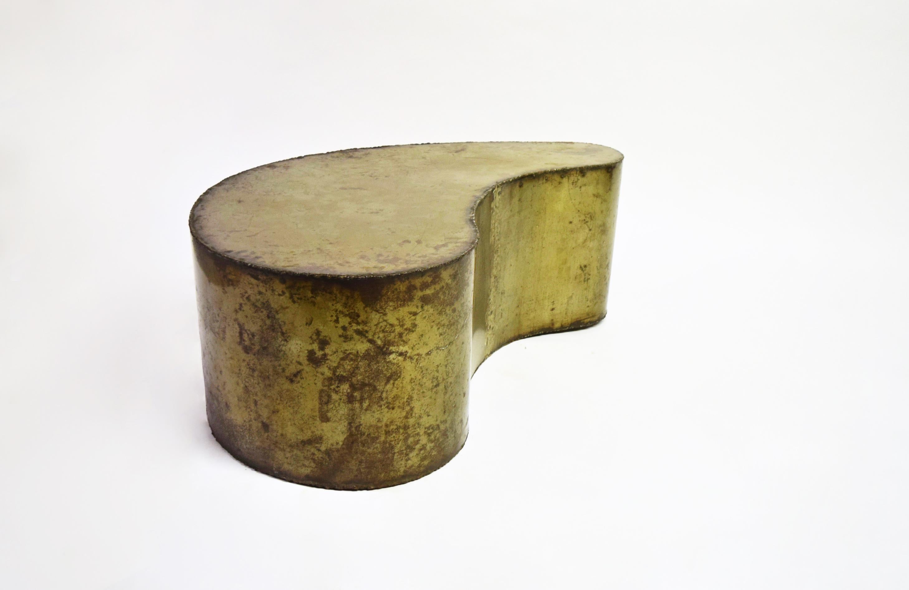 Asymmetrical, kidney-shaped, brutalist coffee table in acid washed metal with raw welding along the edges. The table is finished on both sides as shown.