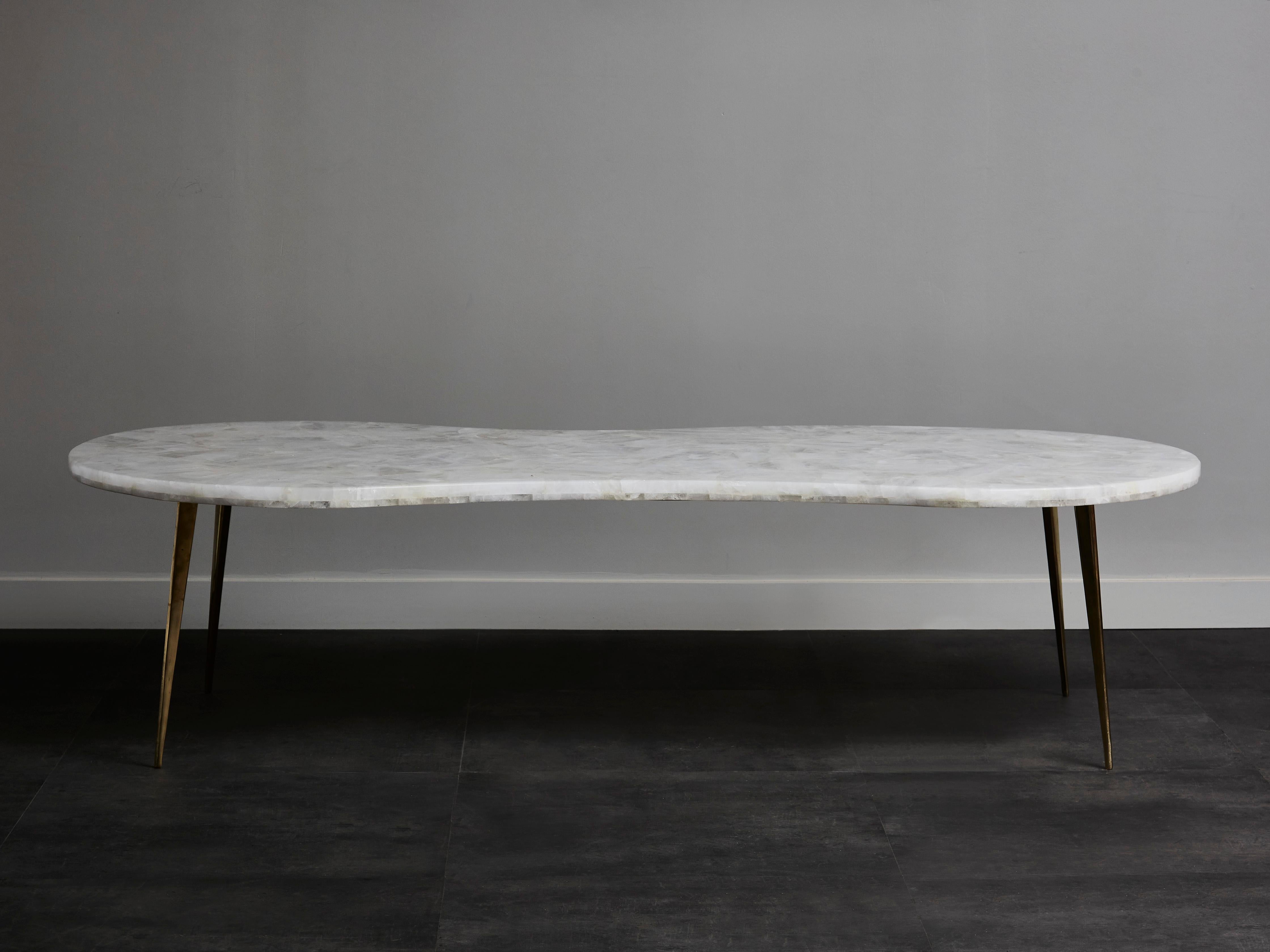 Unique free shaped coffee table in sculpted rock crystal and brass feet.
Creation by Studio Glustin.
France, 2019.