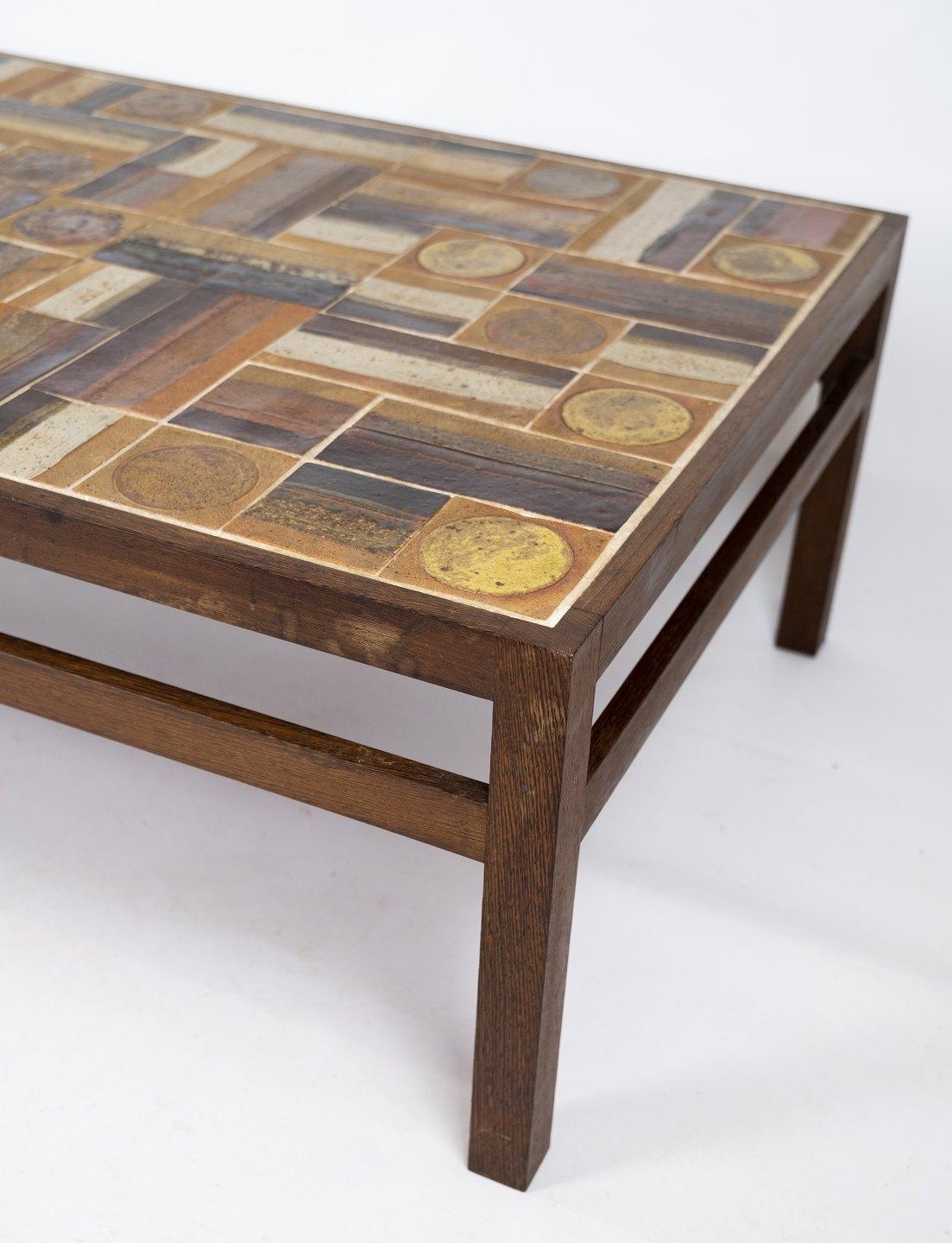Danish Coffee Table in Rosewood and Dark Tiles, Designed by Tue Poulsen from the 1970s