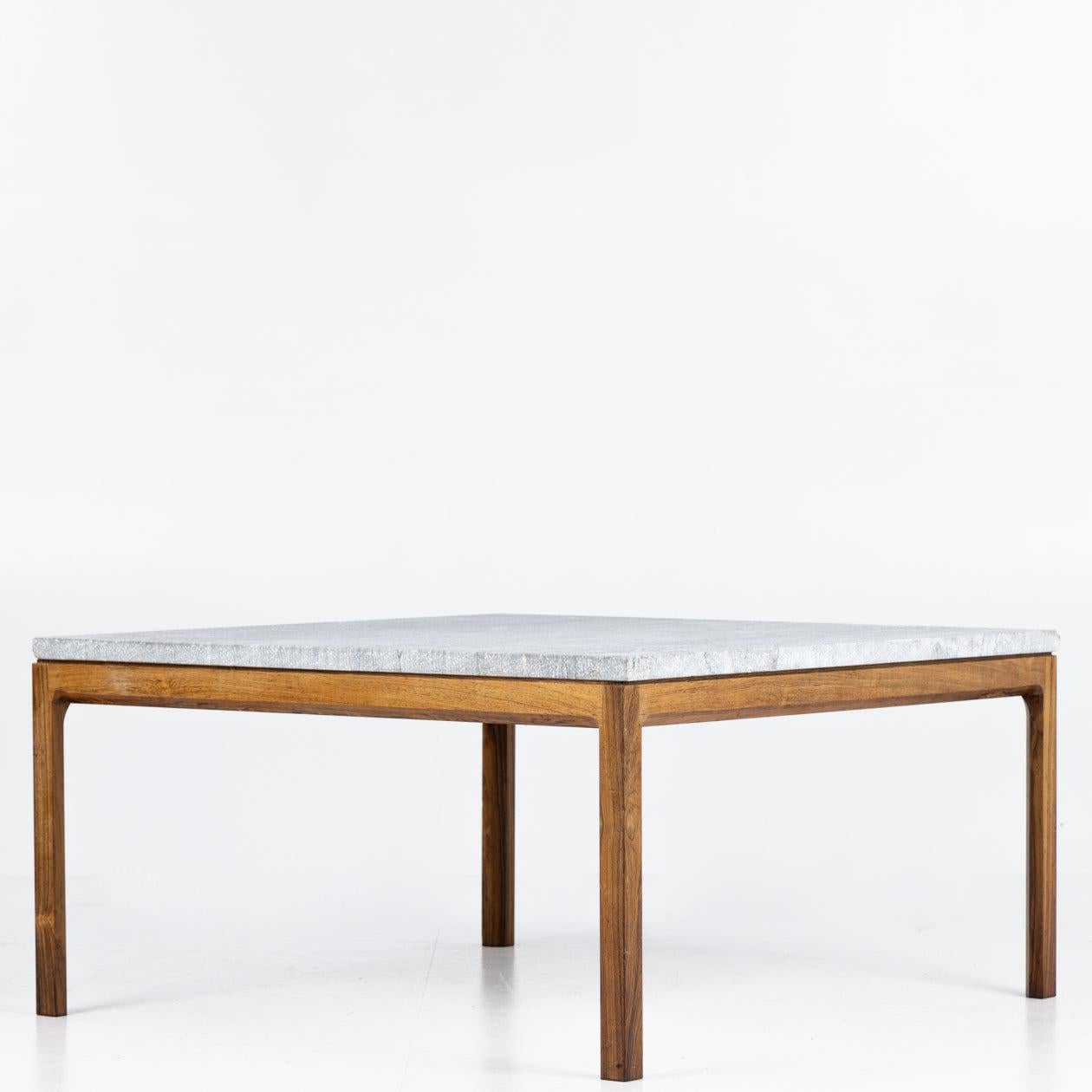 Coffee table in rosewood and Cippolini marble top.
Manufactered by Wørts Møbelsnedkeri.