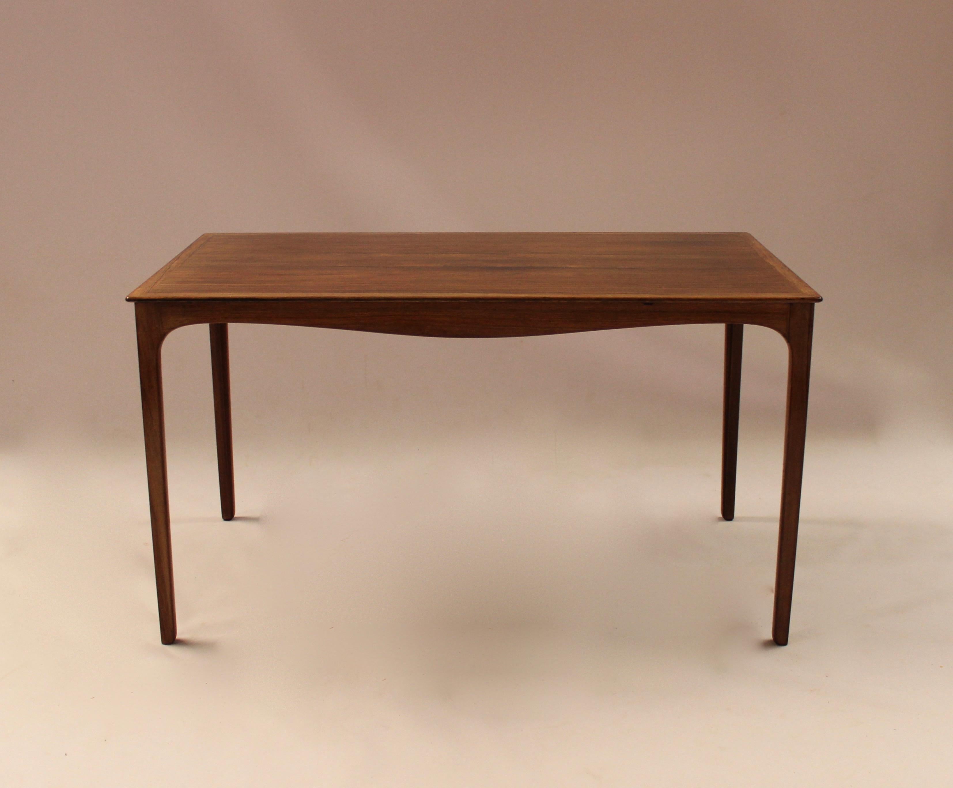 Coffee table in rosewood designed by Ole Wanscher and manufactured by A. J. Iversen in the 1960s. The table is in great vintage condition.