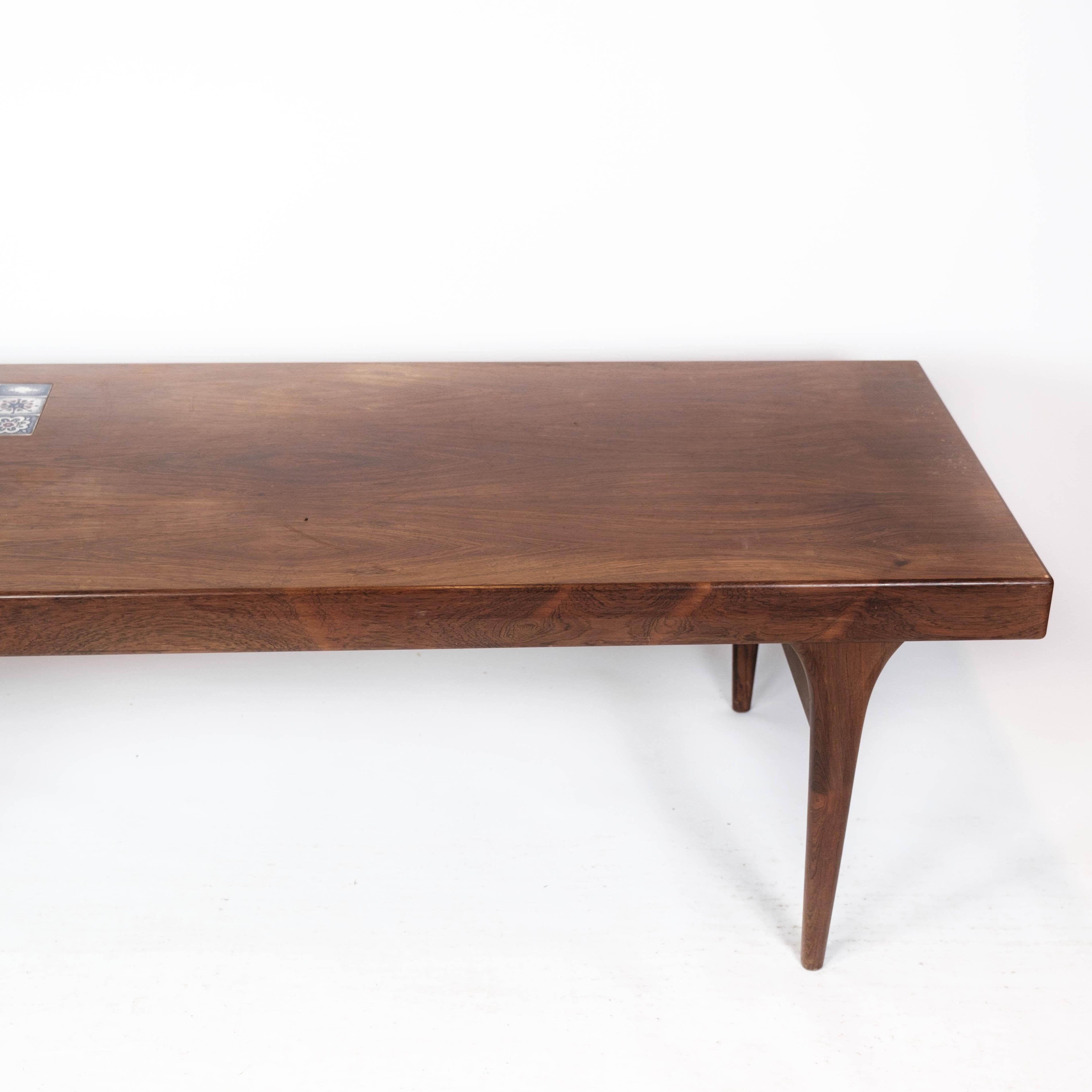 Scandinavian Modern Coffee Table Made In Rosewood With Blue Tiles by Johannes Andersen From 1960s For Sale