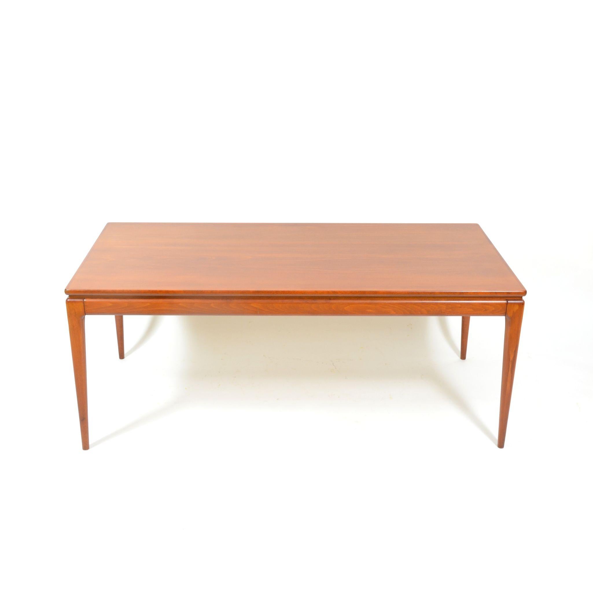 Coffee table in stained beech manufactured in 1980s in former Czechoslovakia by Drevotvar Jablonné. Shapes inspired by Scandinavian design. In very good original condition, only with some small sings of use.
