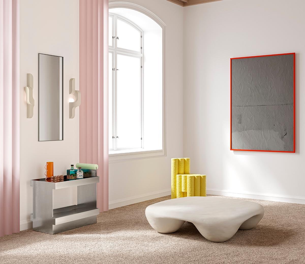 Quad Table, cast in stone composite. It features a bright white color and a matte finish achieved through a blend of marble dust and resin. This innovative composition enhances durability and reduces weight.

As a low, sculptural piece, the Quad