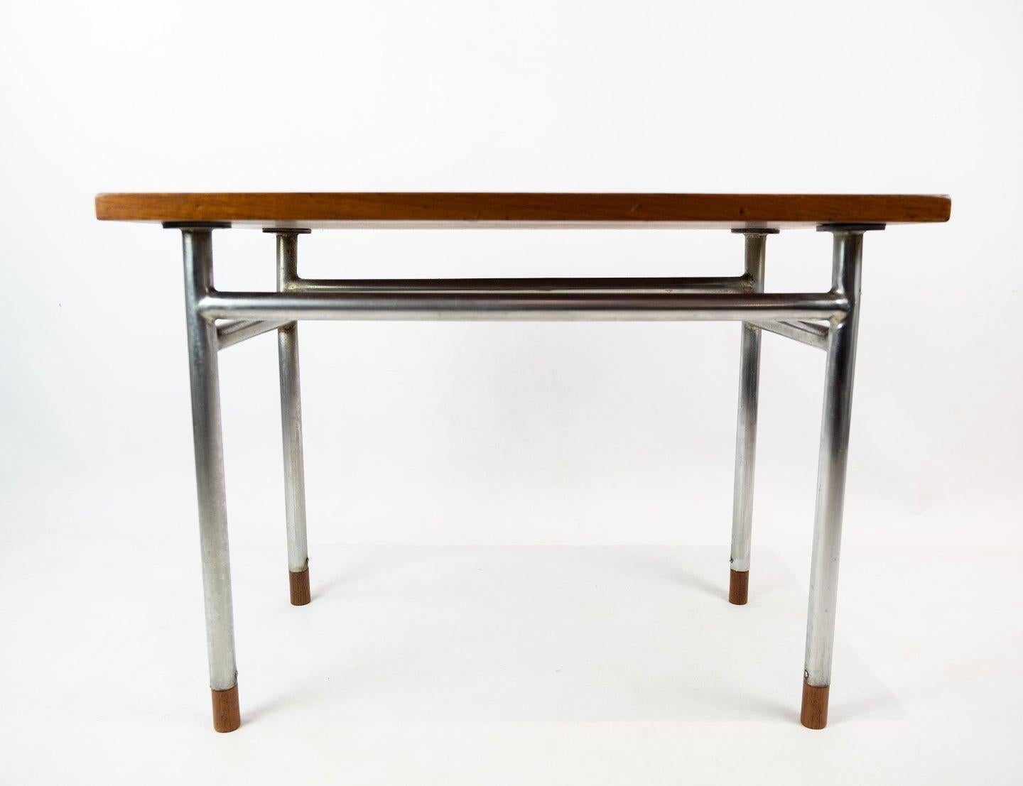 Scandinavian Modern Coffee Table in Teak and Legs in Metal, Designed by Hans J. Wegner, 1960s For Sale