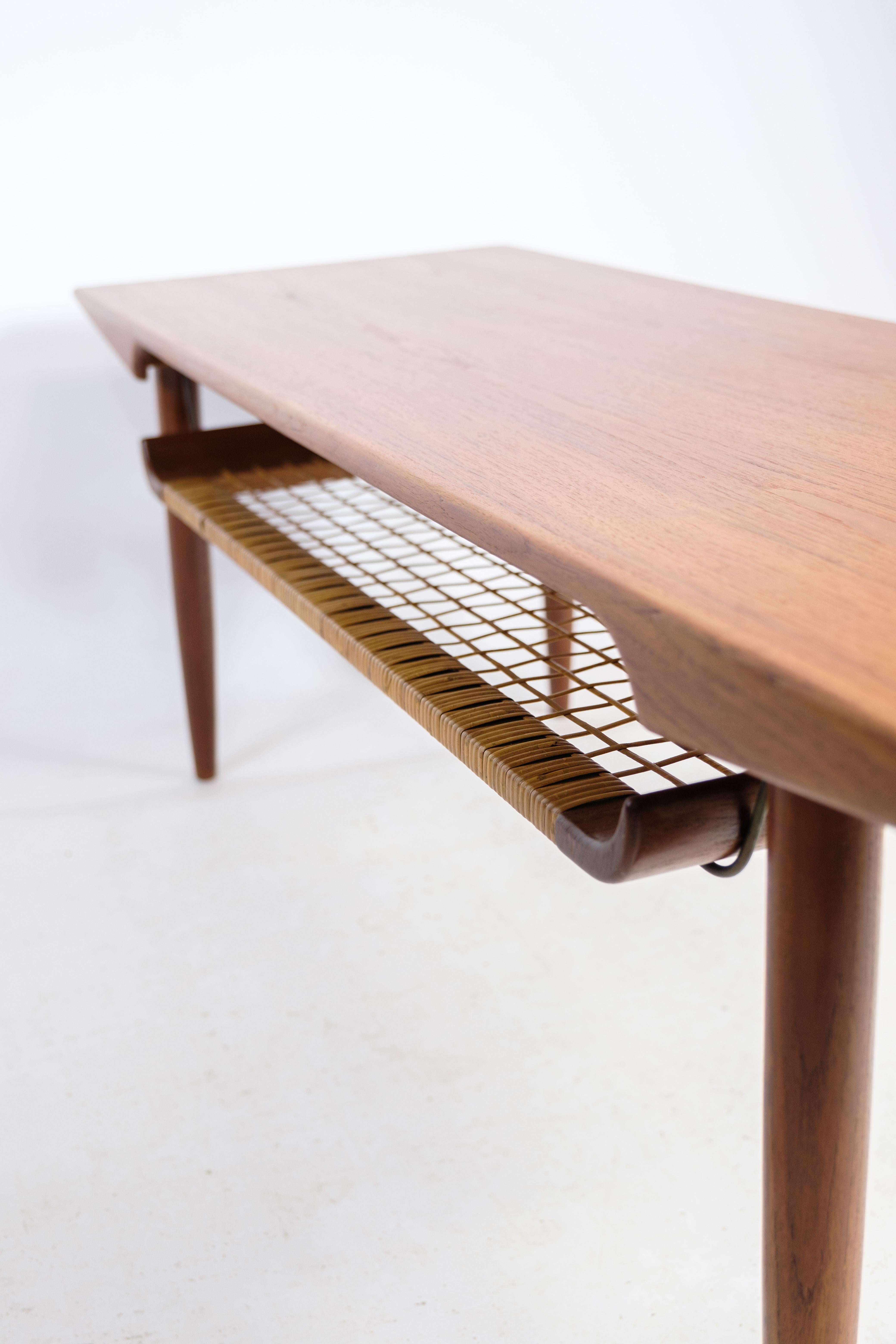 Mid-20th Century Coffee Table in Teak and Paper Cord Shelf of Danish Design from the 1960s For Sale