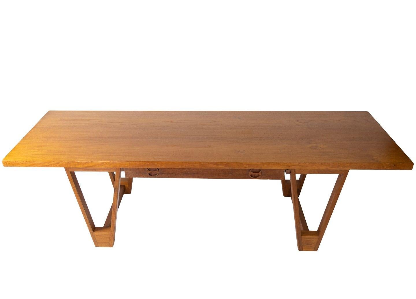 Coffee table in teak designed by Illum Wikkelsø from the 1960s. The table is in great vintage condition.
Measures: H - 51 cm, W - 178 cm and D - 60 cm.
