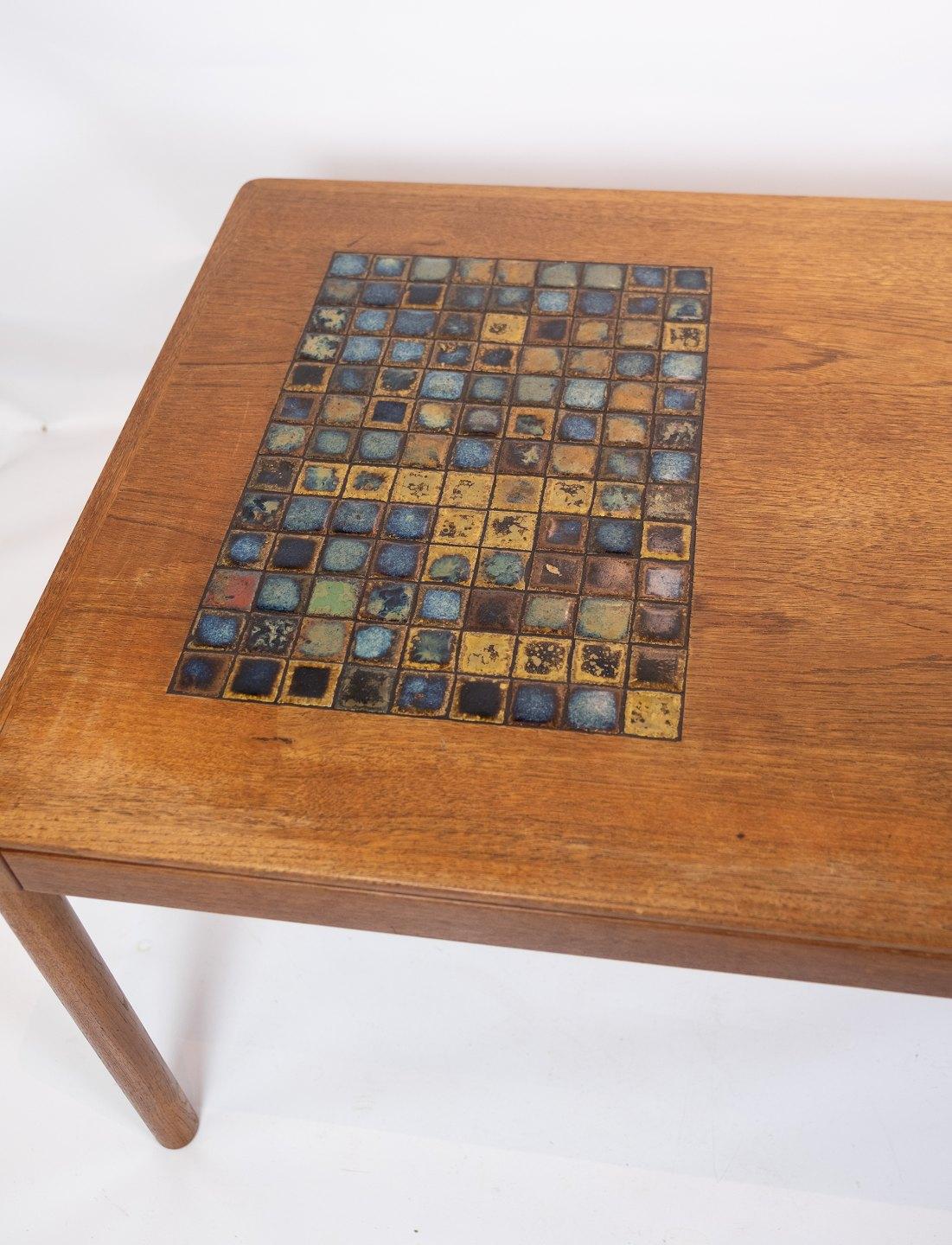 Scandinavian Modern Coffee Table in Teak with Brown Ceramic Tiles of Danish Design from the 1960s For Sale