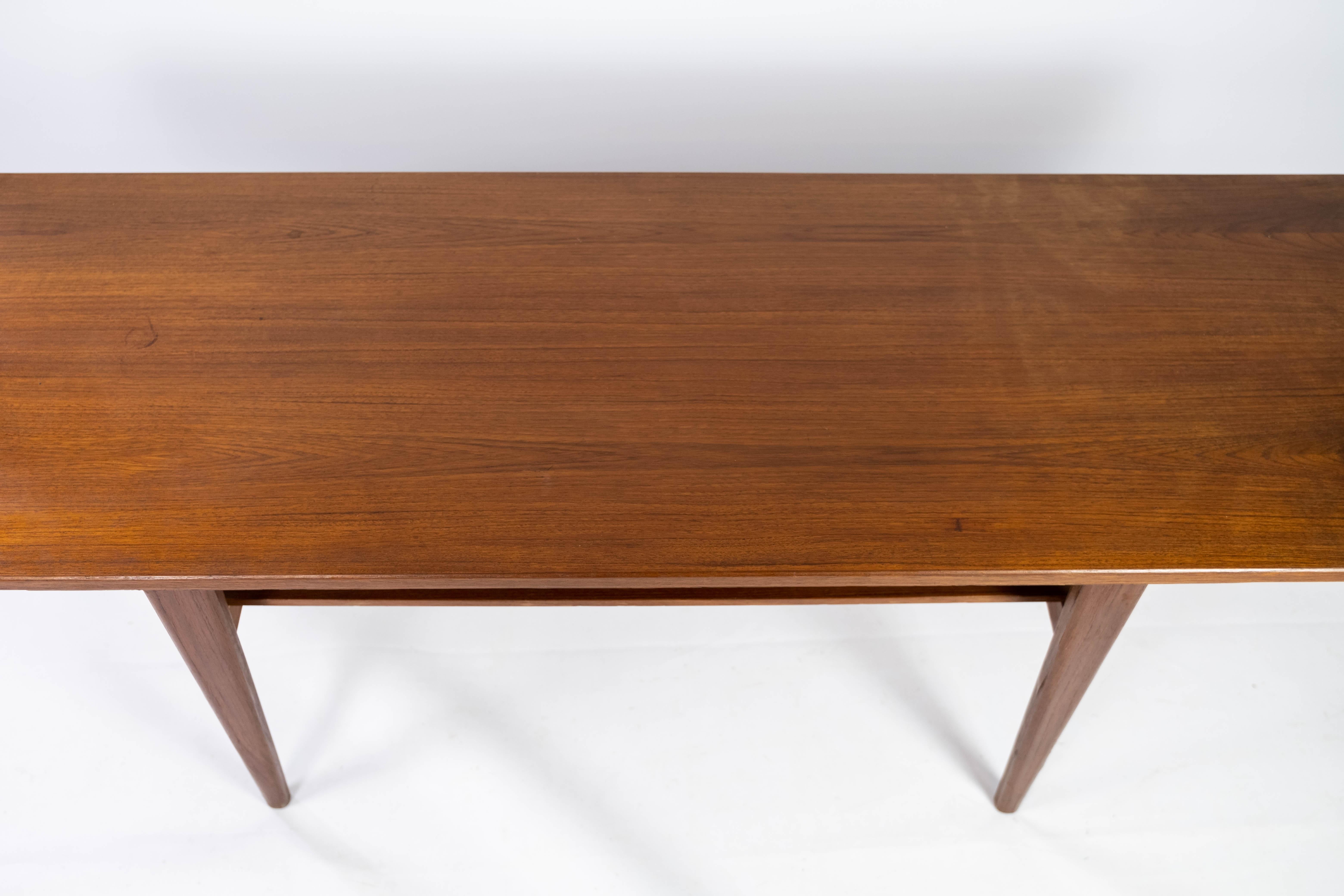 Mid-20th Century Coffee Table Made In Teak With Shelf, Danish Design From 1960s For Sale