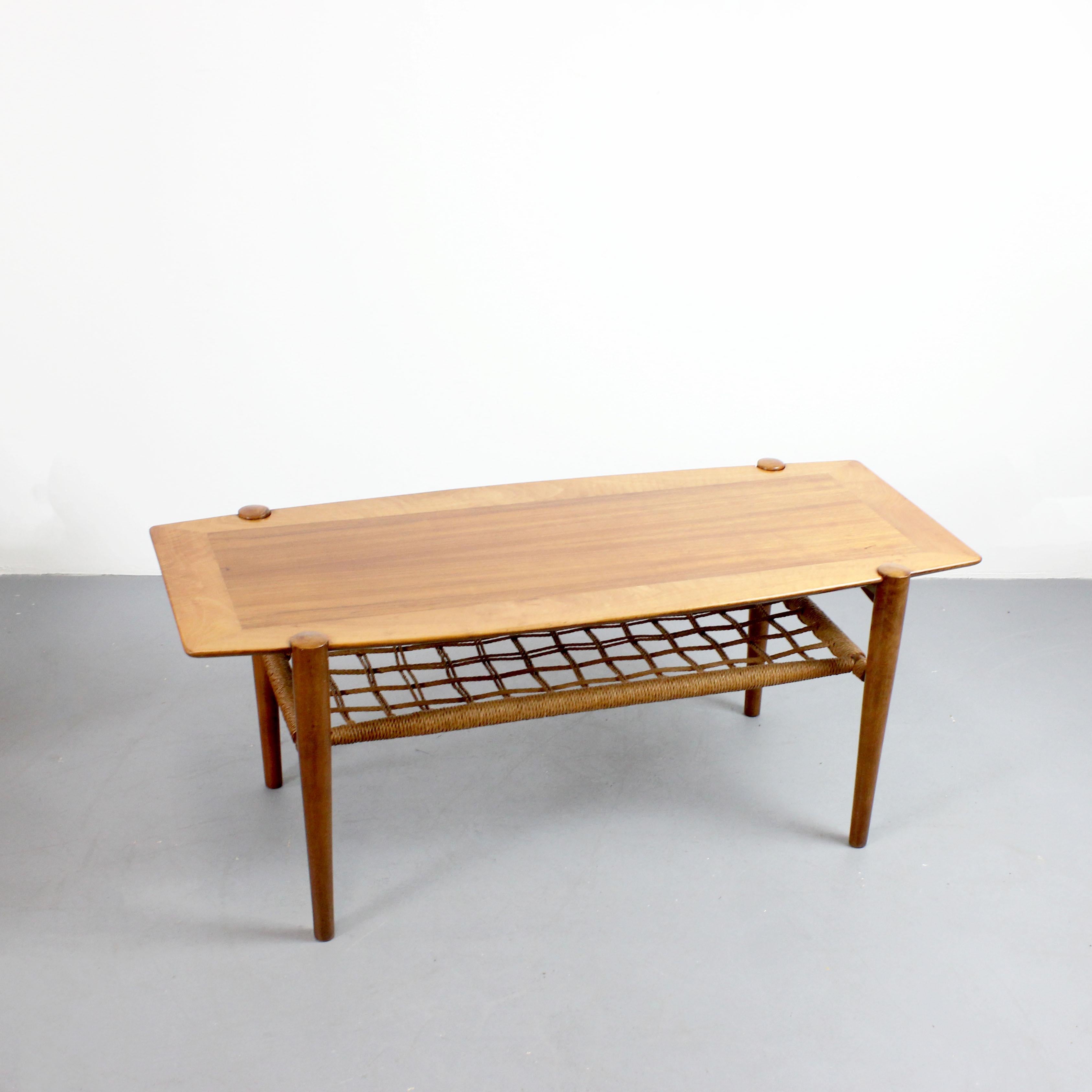 Teak wood coffee table with a braided rope shelf, attributed to Louis Van Teeffelen, Netherlands, circa 1960.
