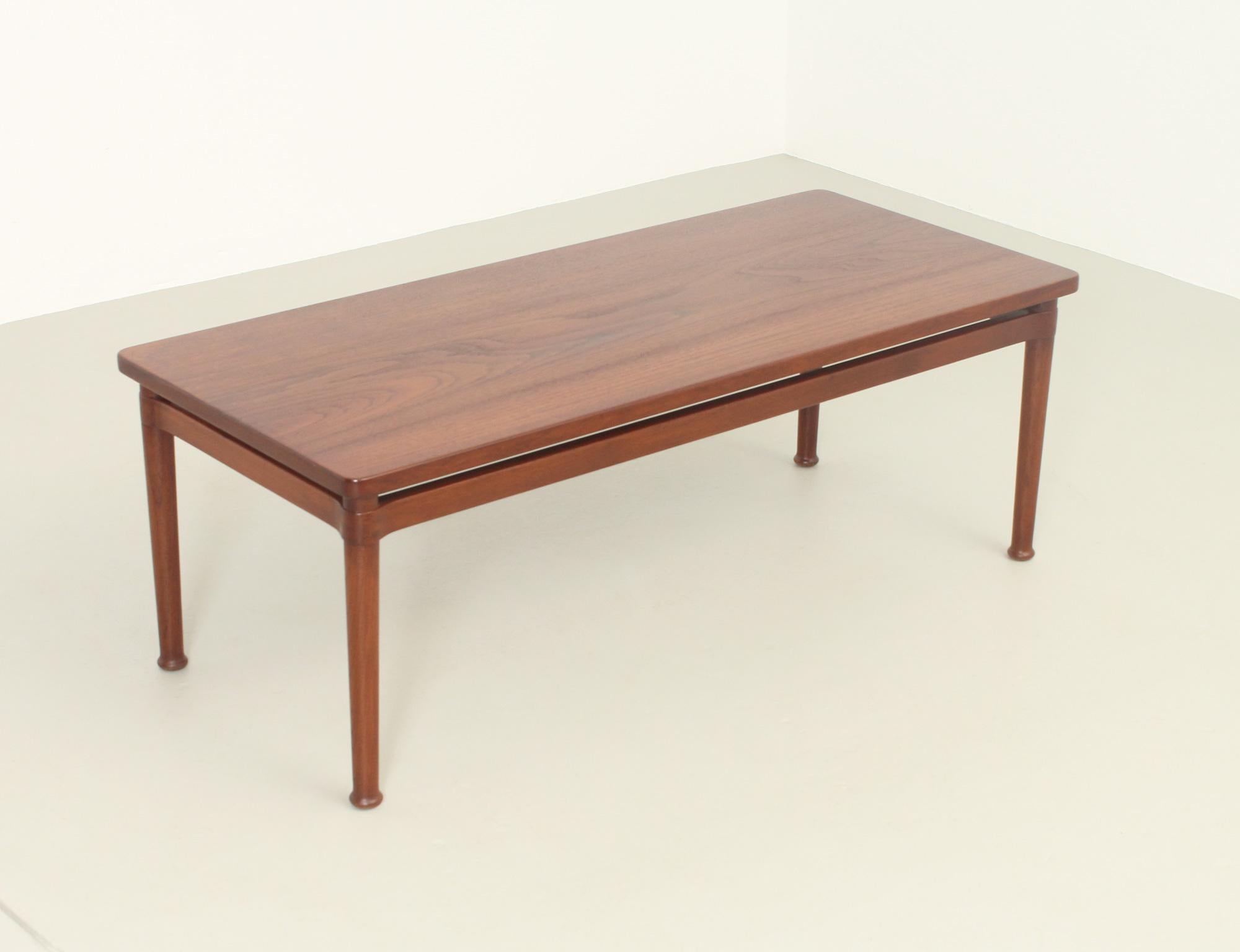 Rectangular coffee table designed in 1950's by Kai Lyngfeldt Larsen for Søborg Møbler, Denmark. Very rare model in massive teak wood with nice details in the joints.