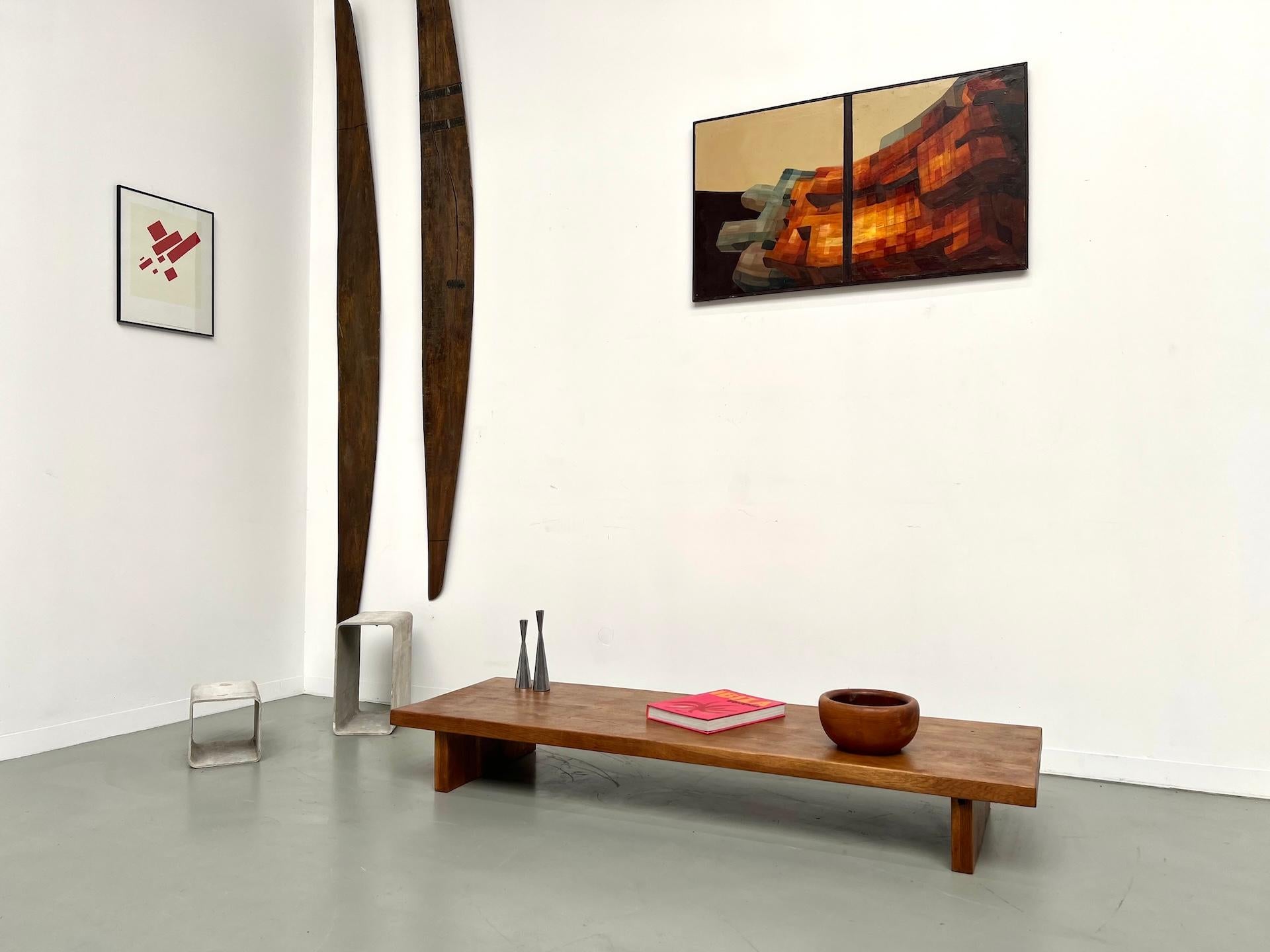 Maison Lecan presents this exceptional coffee table, in the manner of Pierre Chapo, crafted in the 1950s.

Entirely made of solid oak, it highlights the natural beauty of the wood through a generously thick top with a rich grain, enhanced by a warm