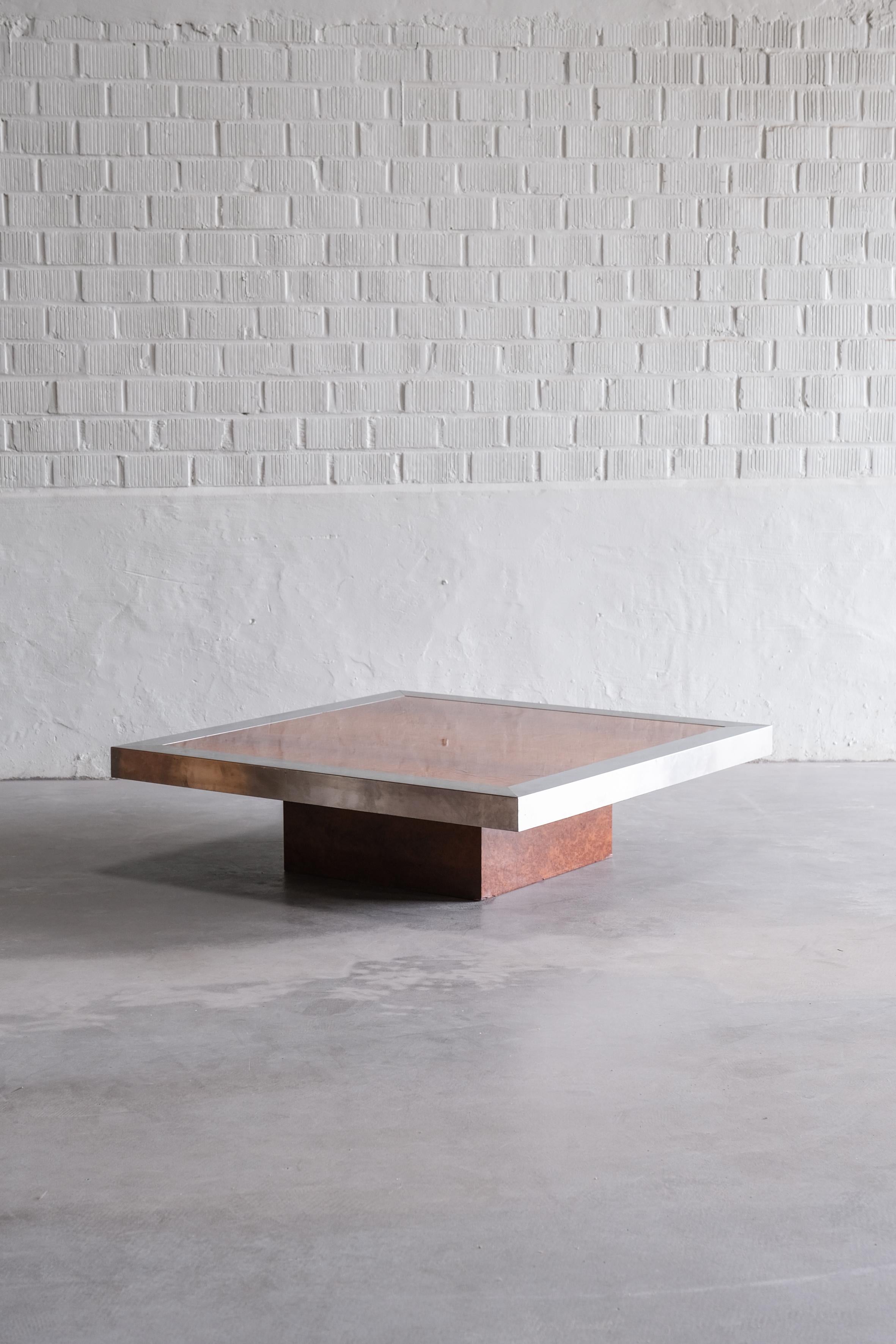 Coffee table lacquered from the 70ties, Italy. 
Looks like a floating platform due to its central base. 

