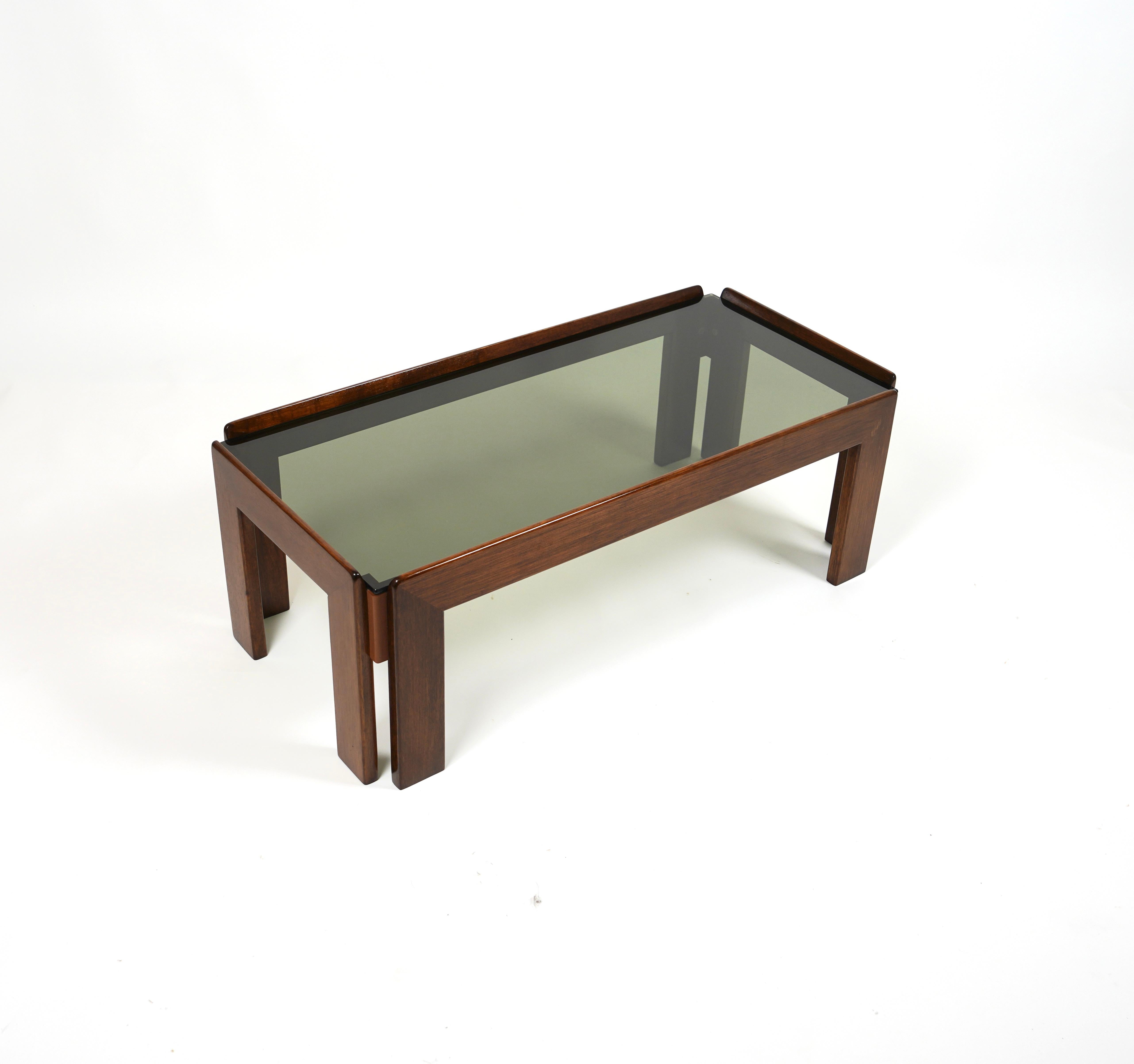 midcentury Rectangular coffee table in solid wood and smoked glass top by Afra & Tobia Scarpa for Cassina.

Made in Italy in the 1960s.

Wood has been polished by a professional restorer.

Chic, distinctive, and cool, the work of